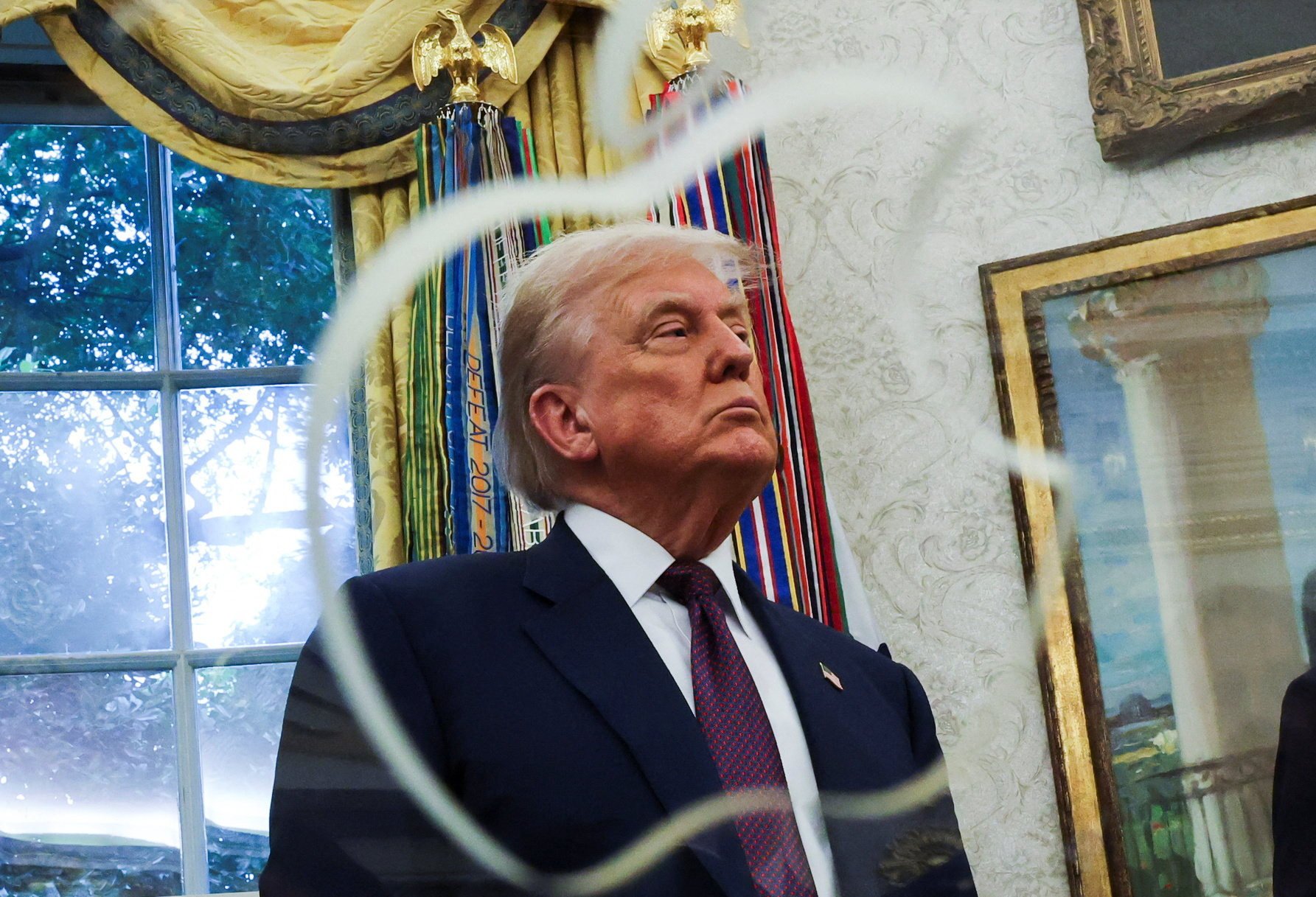 US President Donald Trump said Washington would be imposed a 100 per cent tariff on all semiconductor and chip imports during a visit from Apple CEO Tim Cook. Photo: Reuters