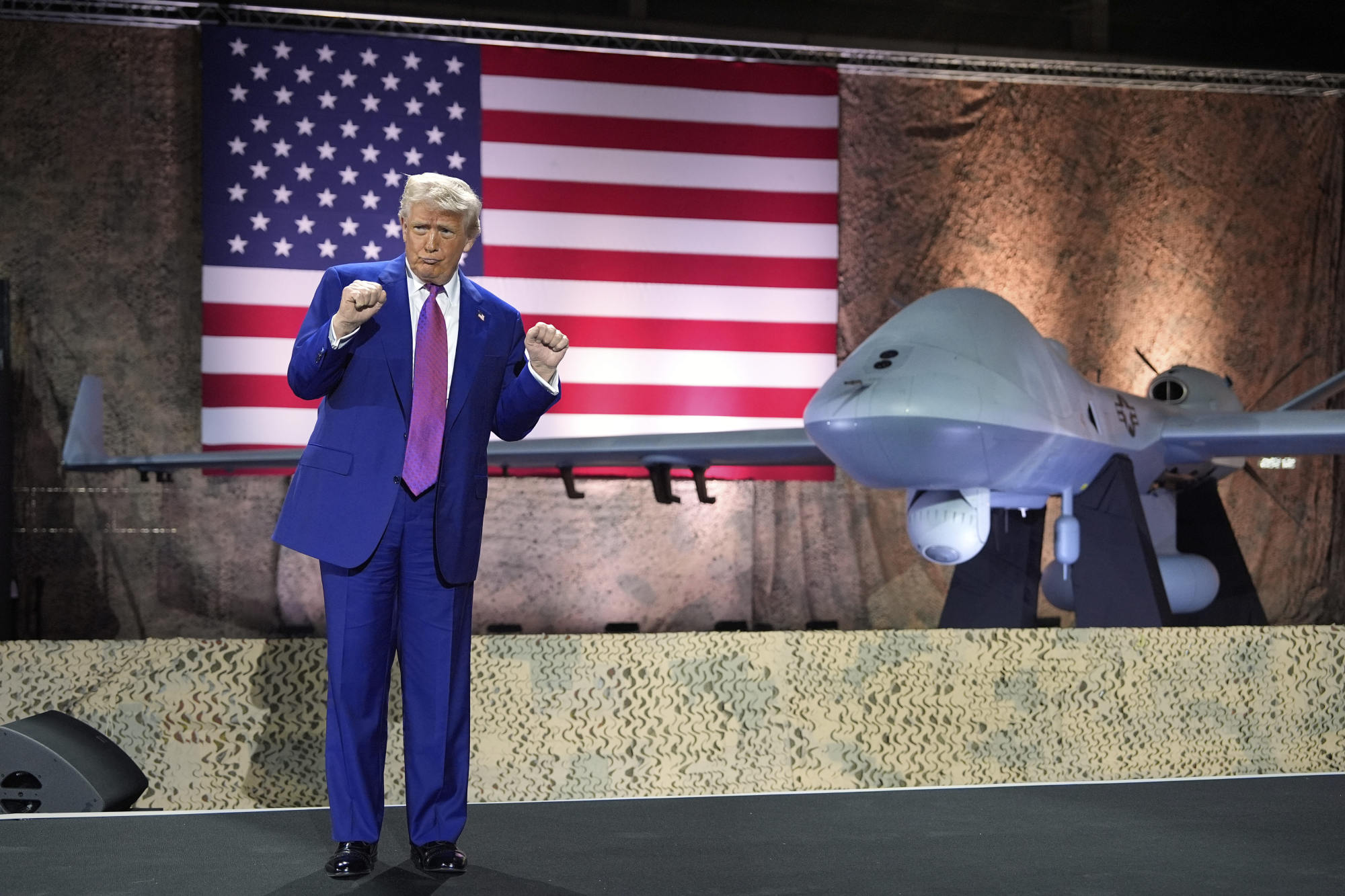 US President Donald Trump makes a presentation in front of an MQ-9 Reaper drone in Doha, Qatar on May 15. Photo: AP US President Donald Trump makes a presentation in front of an MQ-9 Reaper drone in Doha, Qatar on May 15. Photo: AP