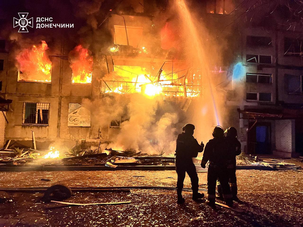 Crews extinguish a structural fire following a Russian strike in Dobropillia, Donetsk region in March. Photo: State Emergency Service of Ukraine/AFP