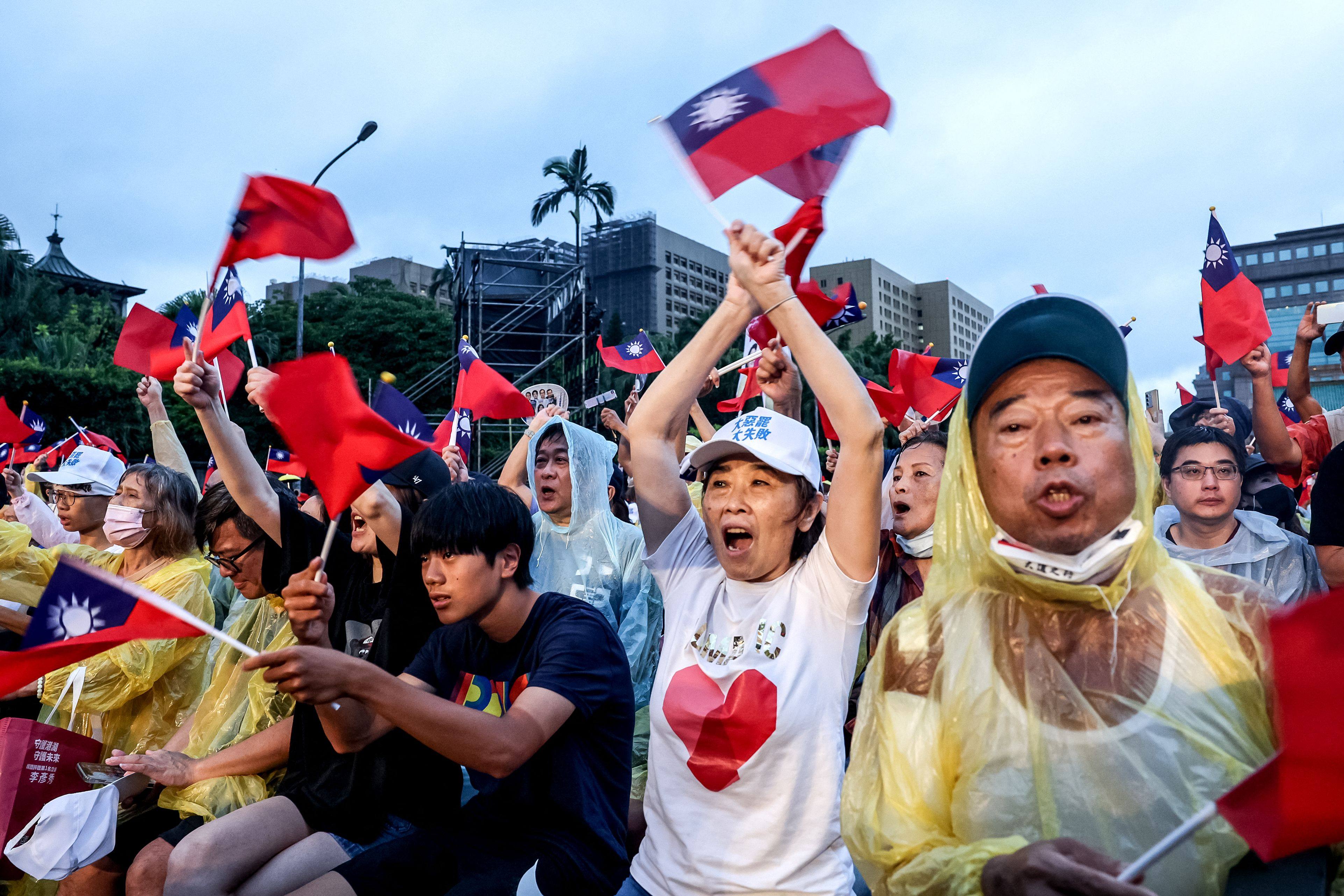 Supporters of Taiwan’s main opposition party  Kuomintang rally against the recall vote, in Taipei on July 25. Photo: AFP