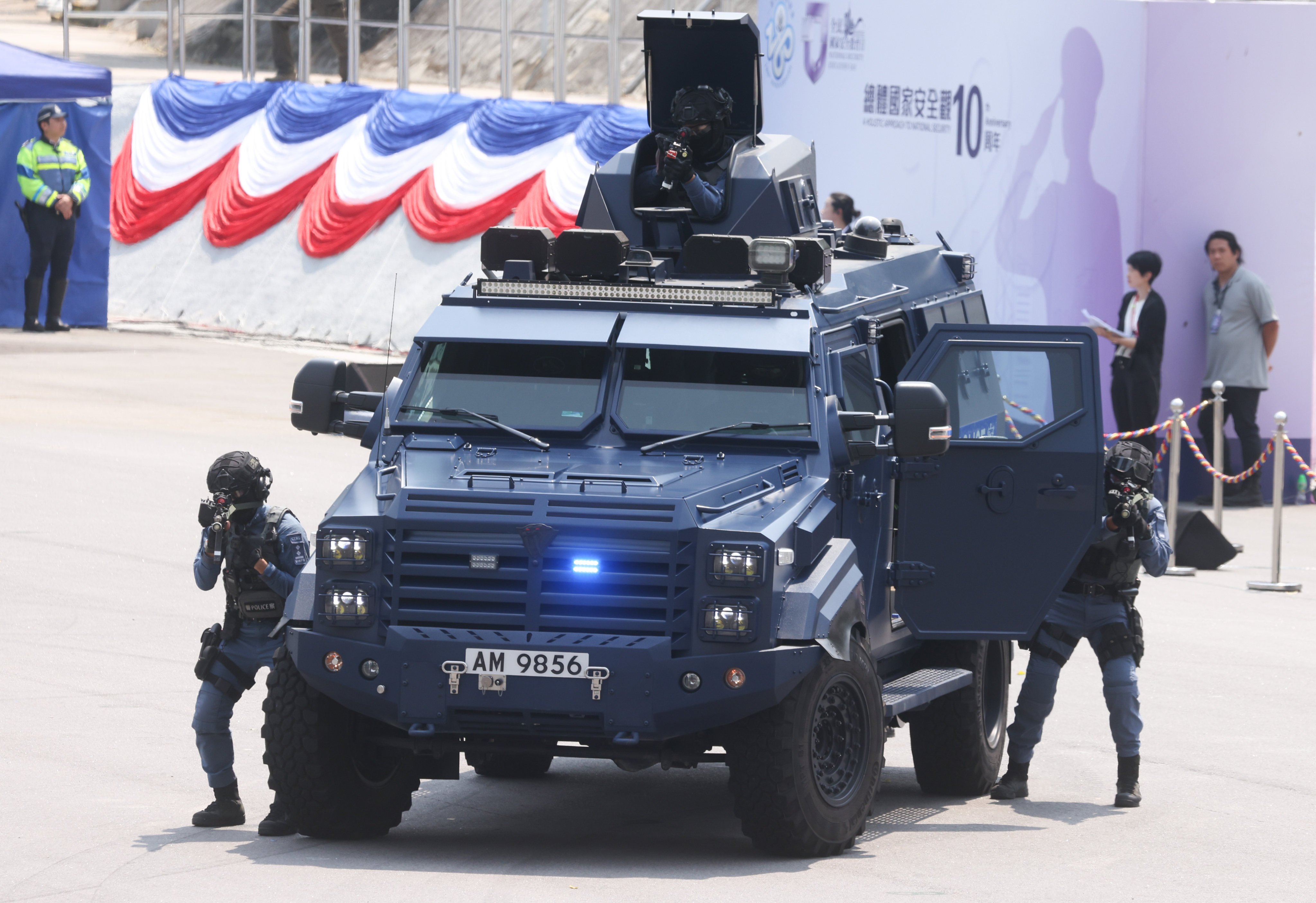Officers stage a counterterrorism drill during a police open day. Photo: Yik Yeung-man