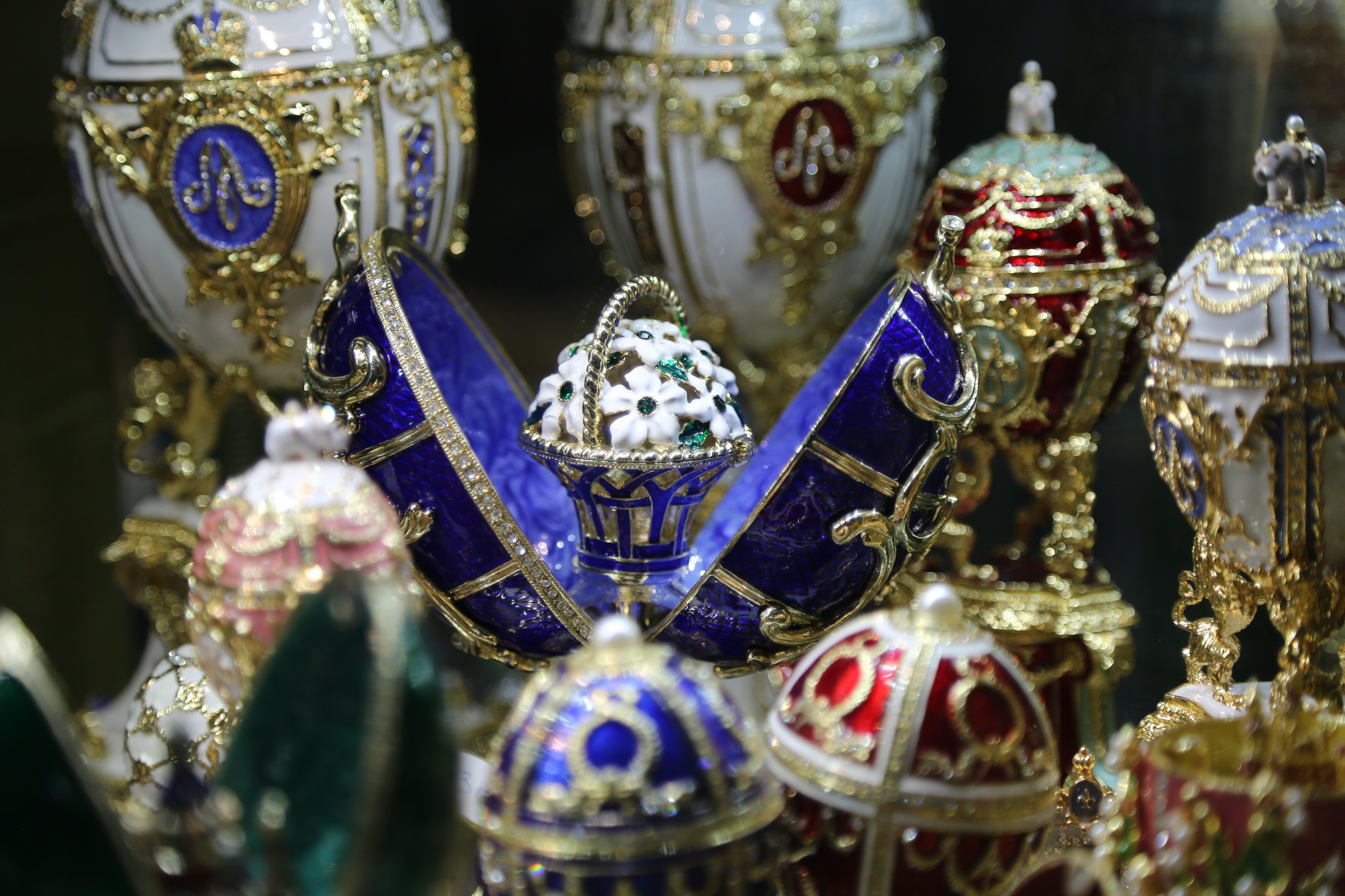 A group of Fabergé eggs in various colors displayed in a museum in St Petersburg, Russia. Photo: Shutterstock