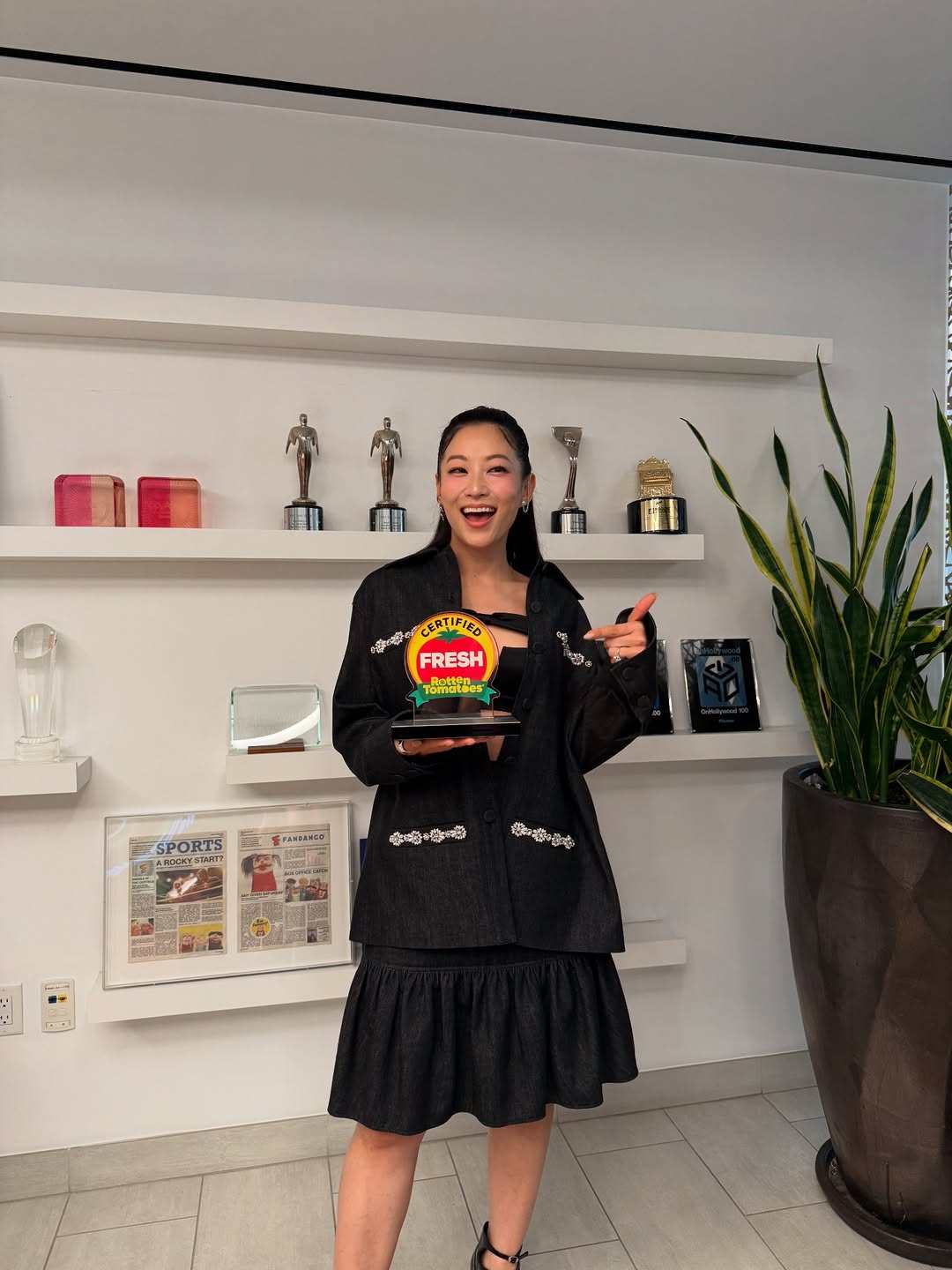 Arden Cho poses with an award for her Netflix film KPop Demon Hunters. Photo: @arden_cho/Instagram
