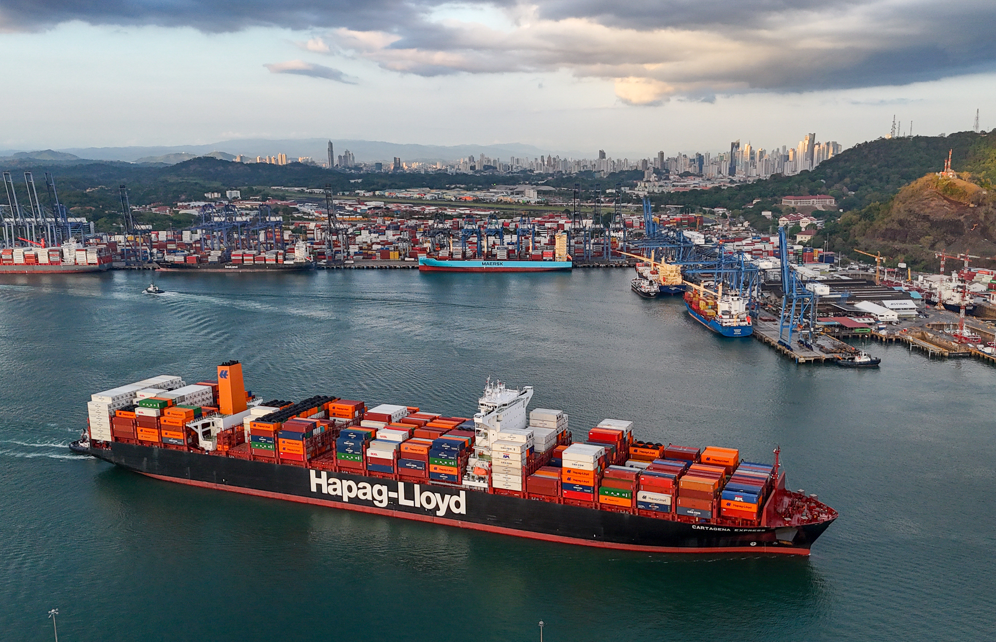 A cargo ship sails past the Panama Canal’s Port of Balboa, managed by CK Hutchison Holdings, in Panama City. Photo: AP