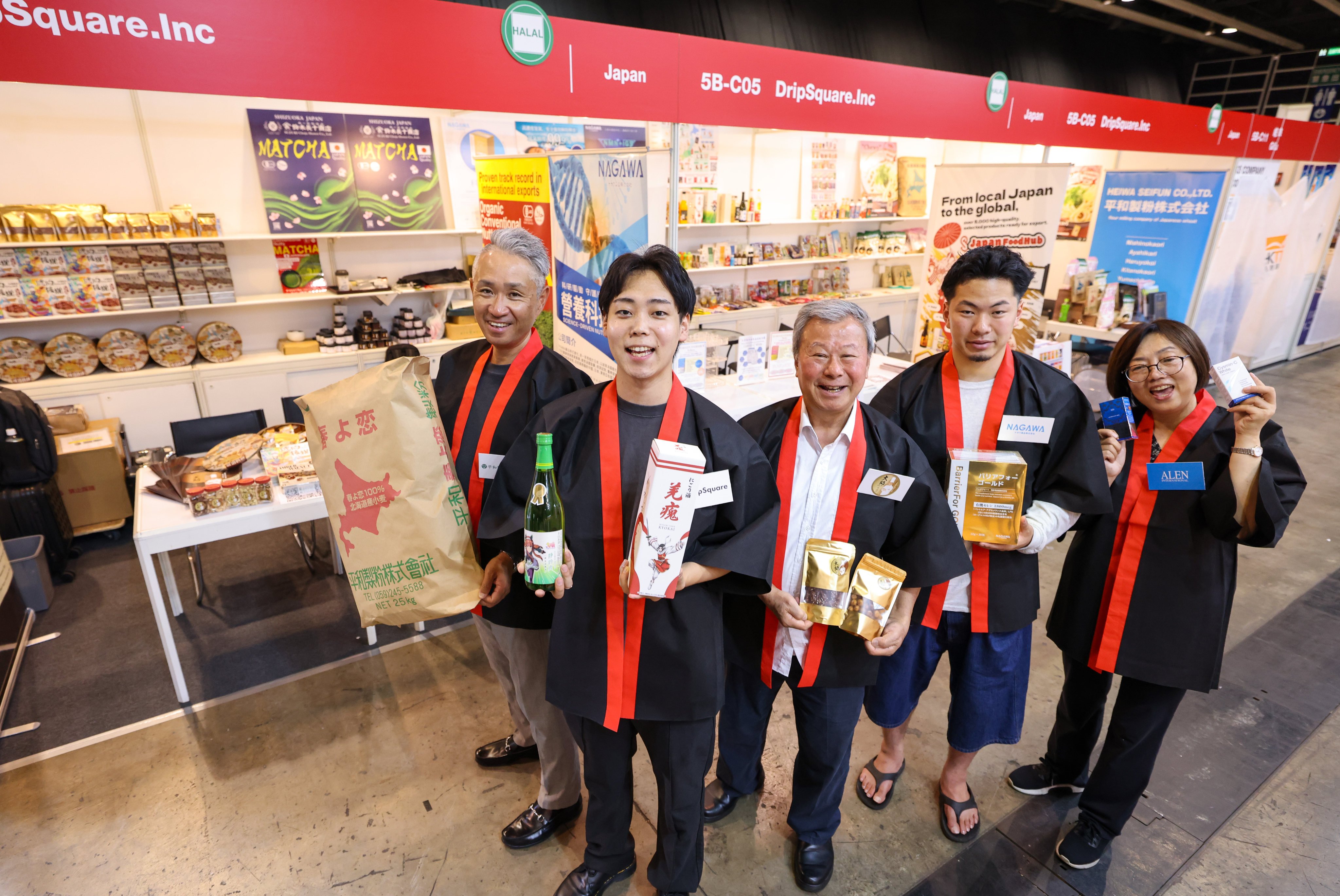DripSquare CEO Eiri Yokota (second from left) and Feng Xia (right), head of overseas markets at Alen International, are hoping to make their mark at the fair. Photo: Nora Tam