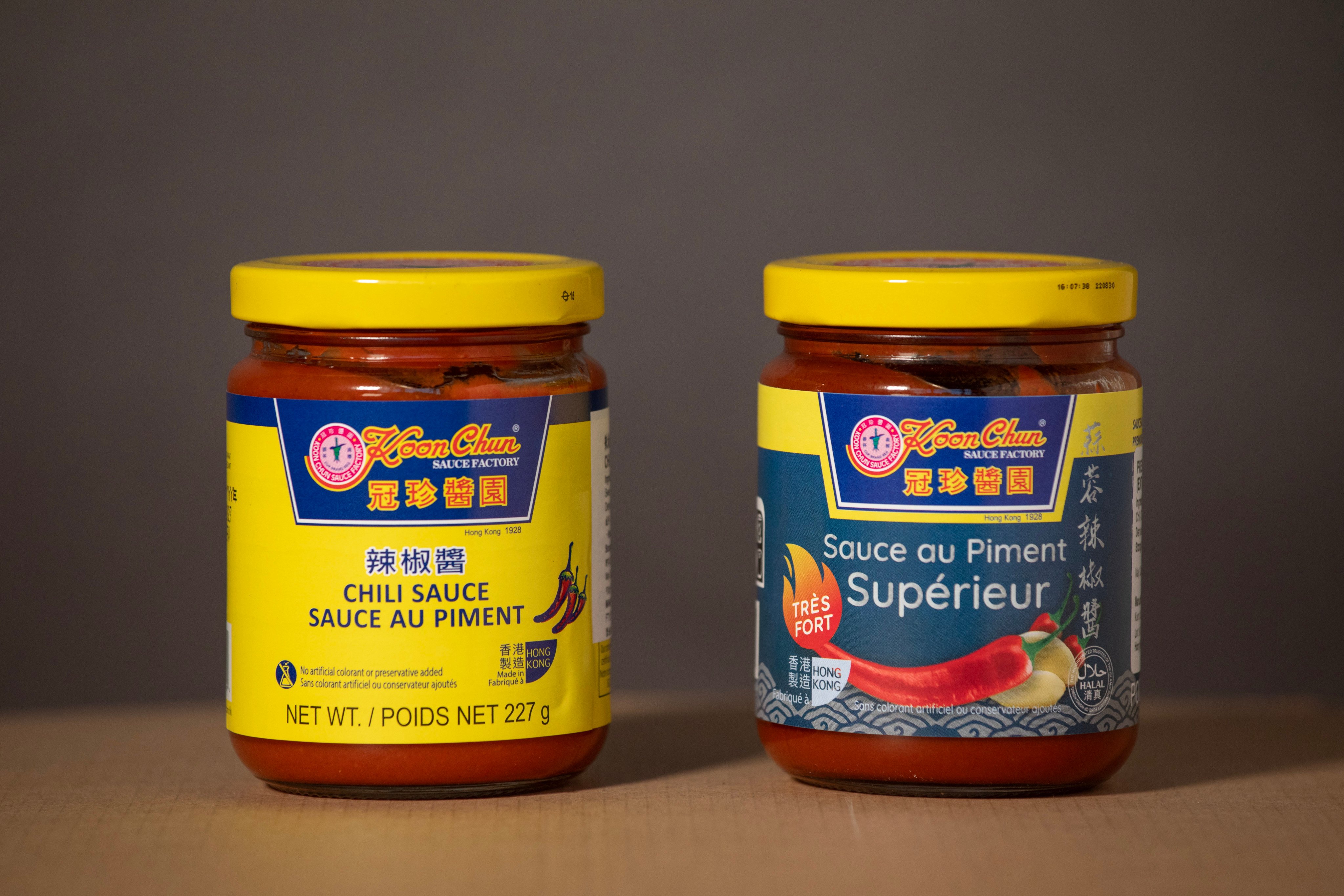 Jars of Koon Chun’s chilli sauces. Photo: Antony Dickson