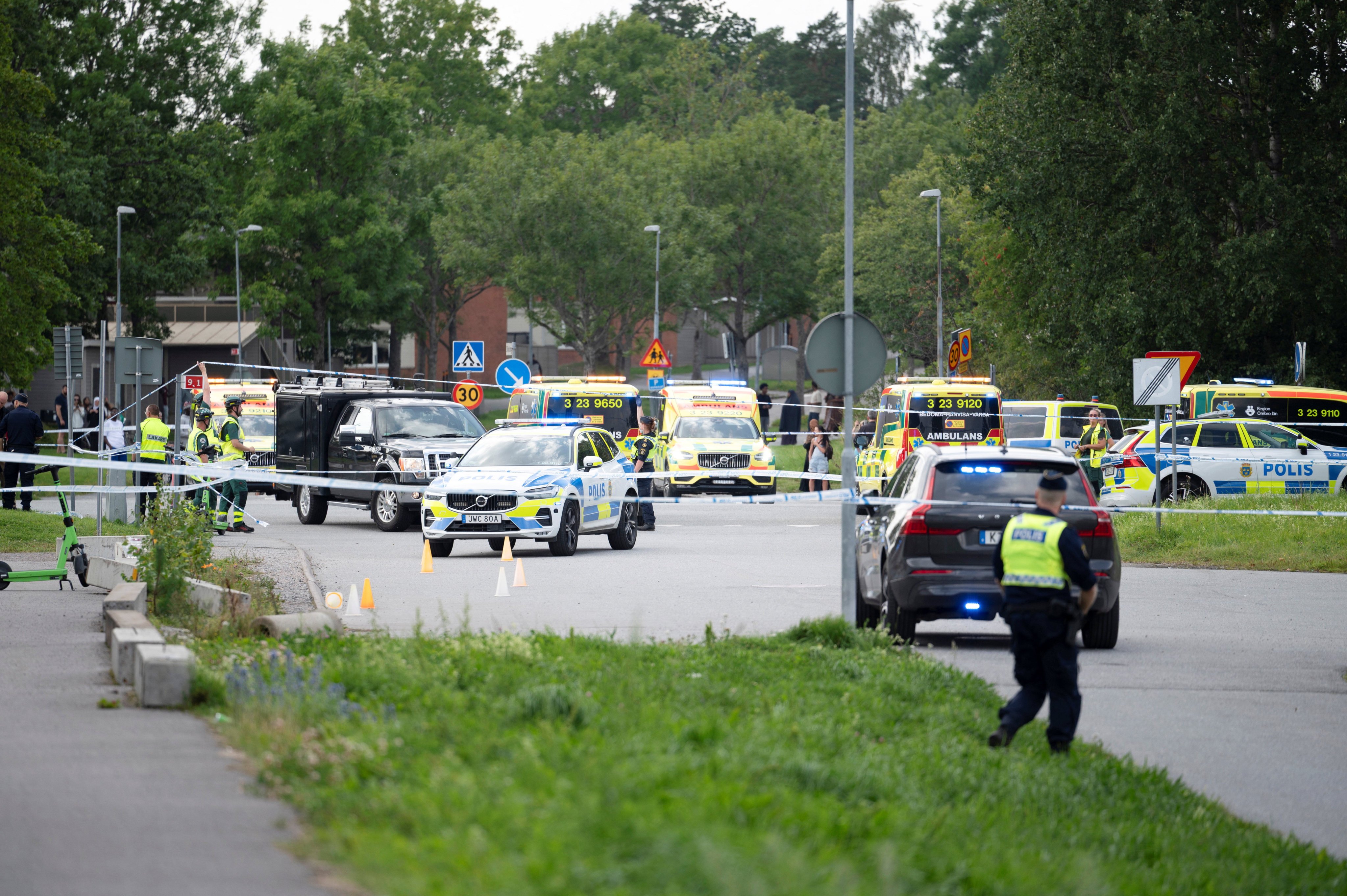 Police and ambulance on scene outside a mosque after a shooting in Orebro, Sweden on Friday. Photo: via Reuters