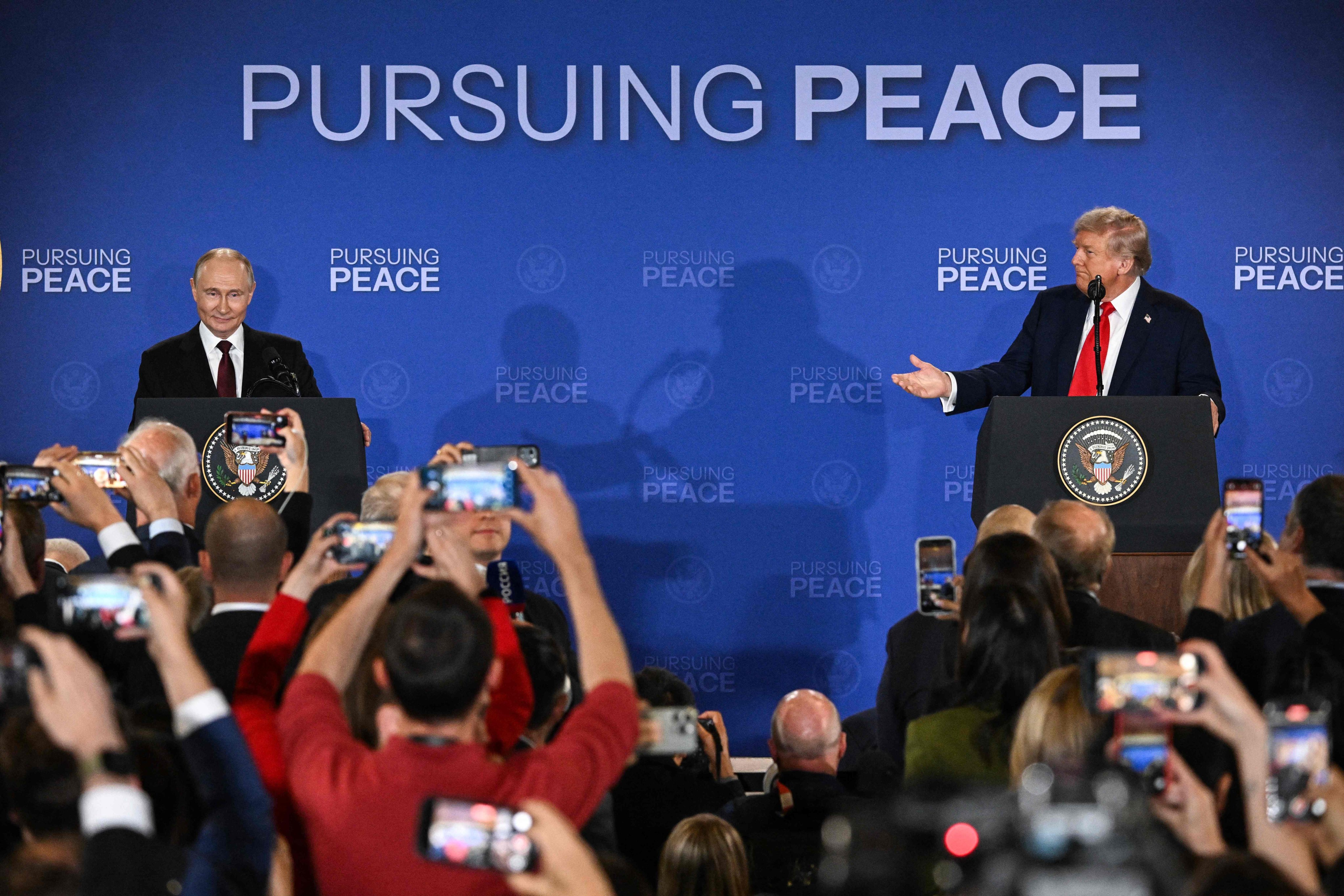 US President Donald Trump (right) and Russian President Vladimir Putin hold a joint press conference after their talks at the Joint Base Elmendorf-Richardson in Anchorage, Alaska, on Friday. Photo: AFP