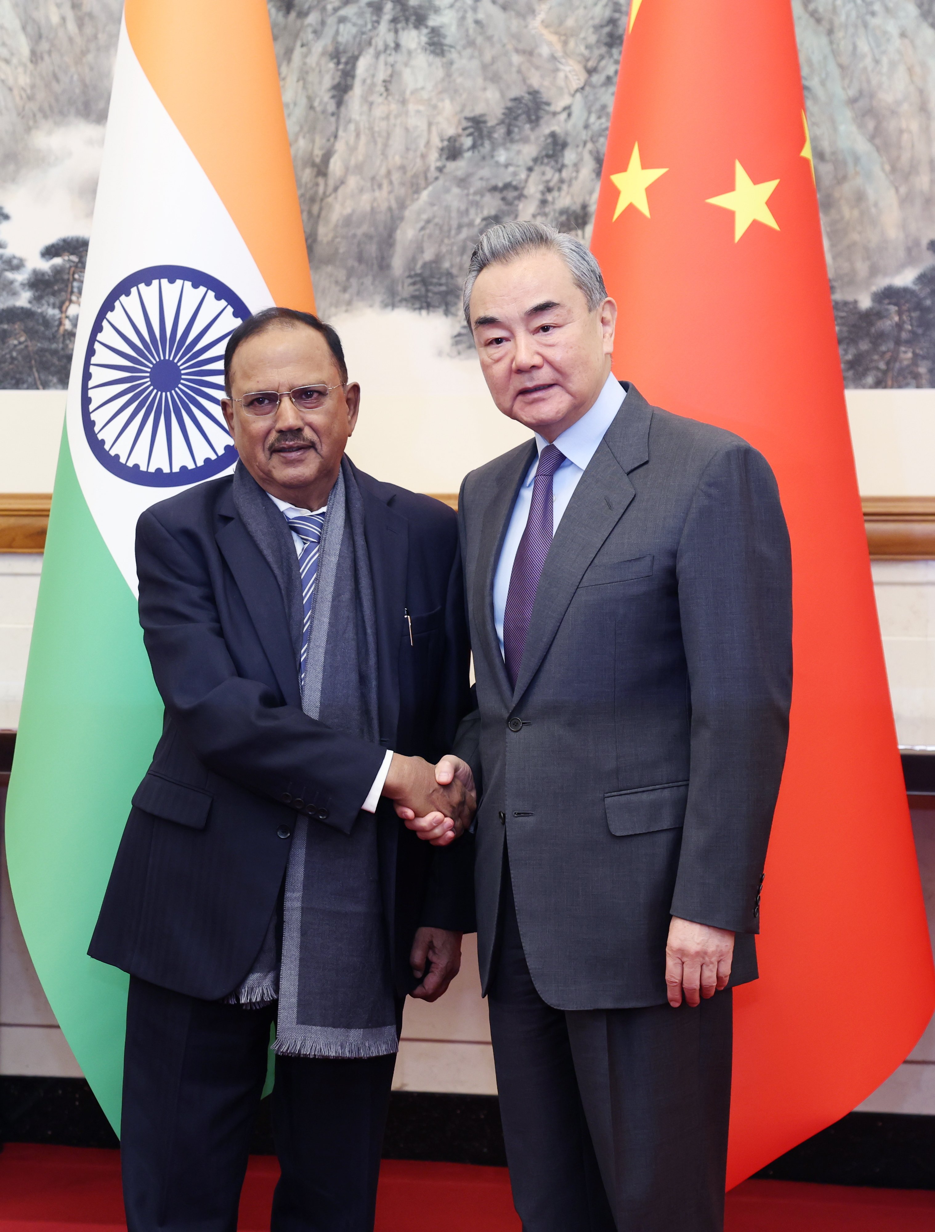 Chinese Foreign Minister Wang Yi with Indian National Security Adviser Ajit Doval, in Beijing on December 18. Photo: EPA-EFE