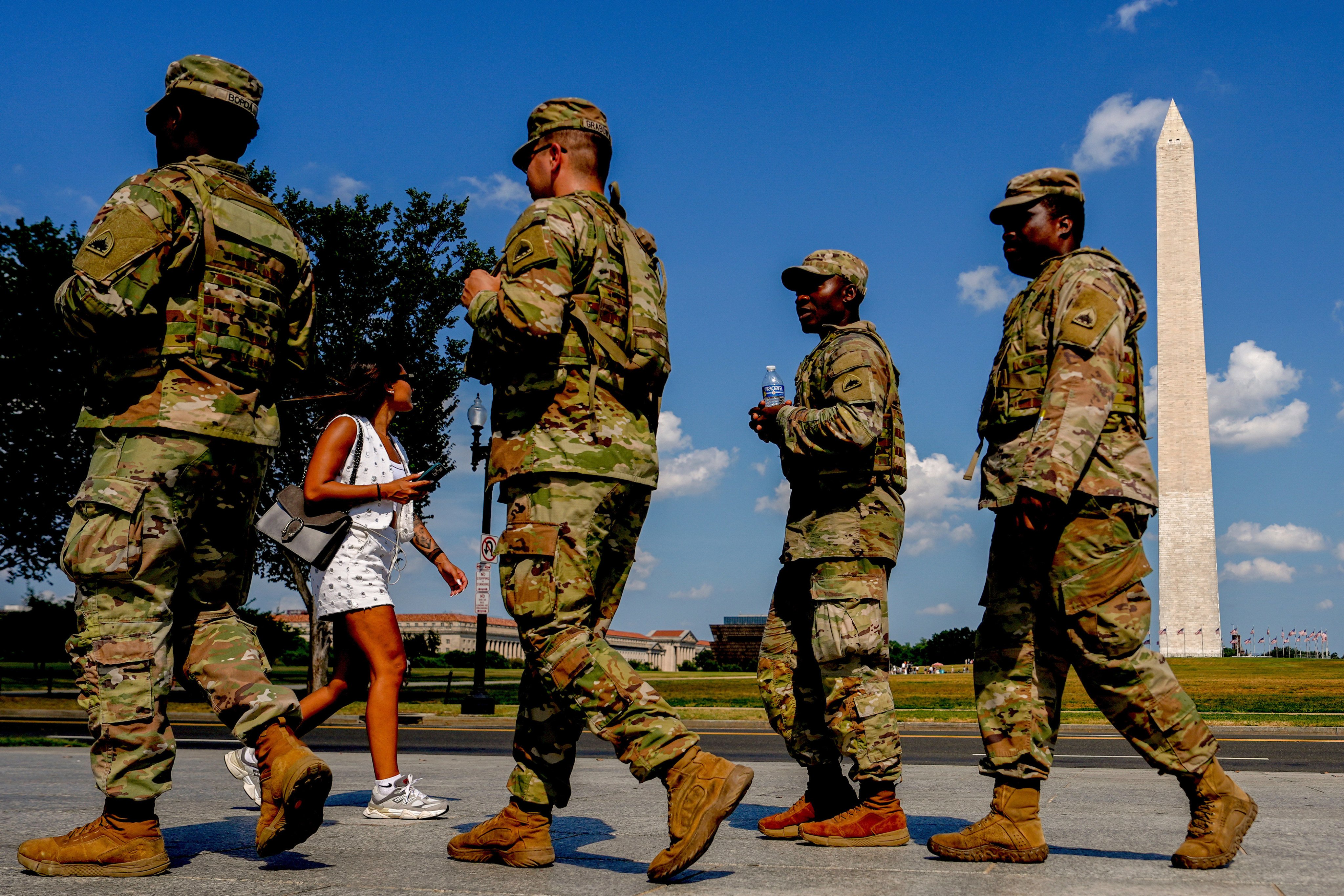 Members of the District of Columbia National Guard patrol along the National Mall in Washington on Saturday. Photo: AP