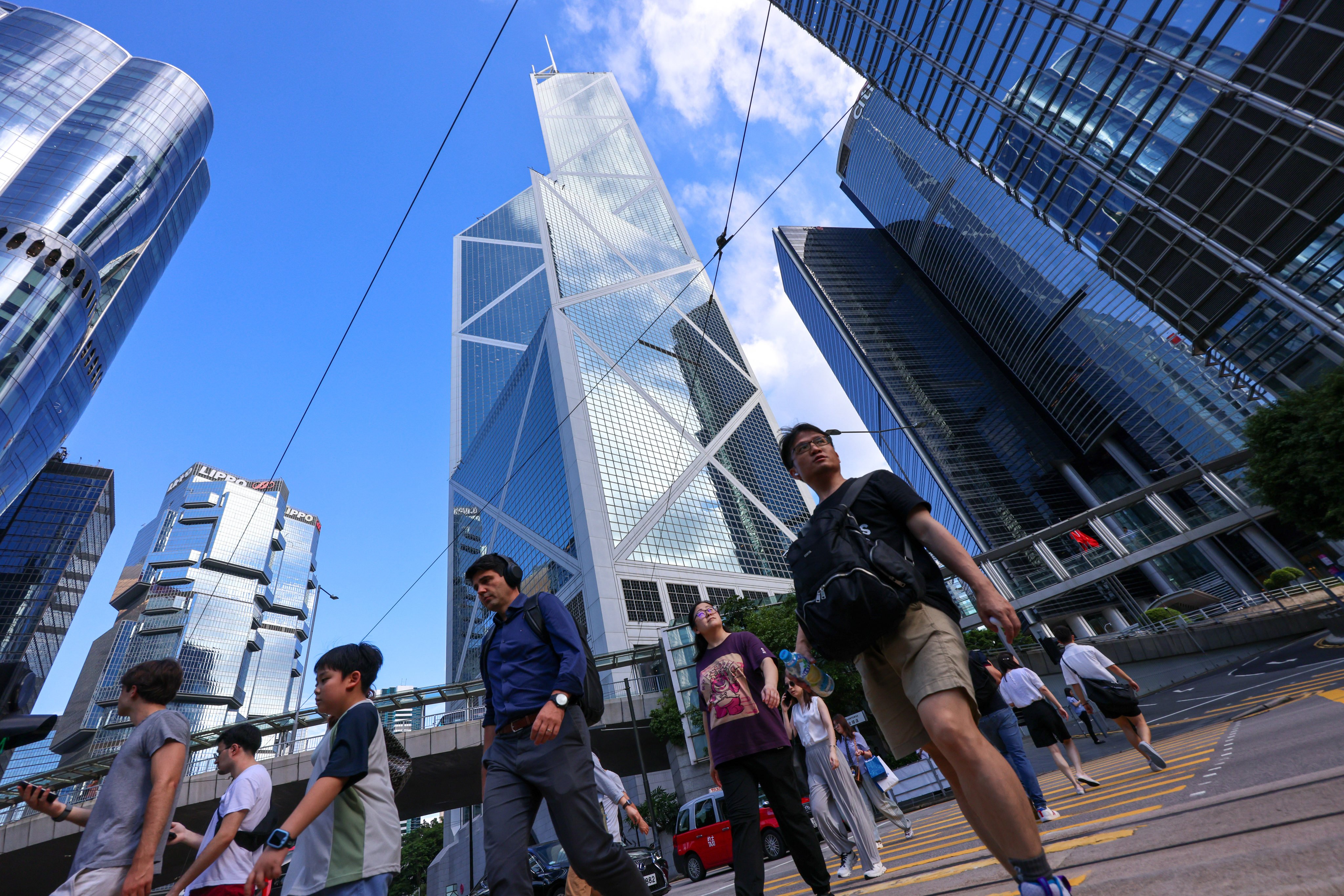 Pedestrians in Central. Authorities said 110,000 Top Talent Pass visas had been approved as of the end of July. Photo: Jelly Tse