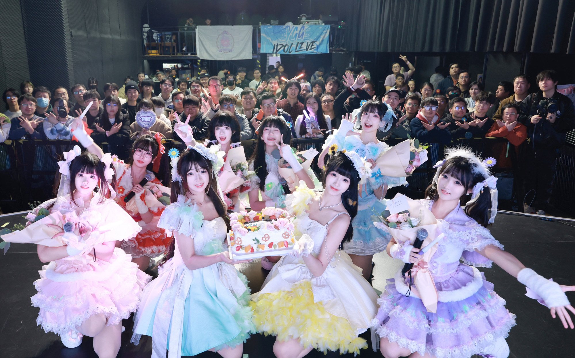 Affloret take a photo with their fans.