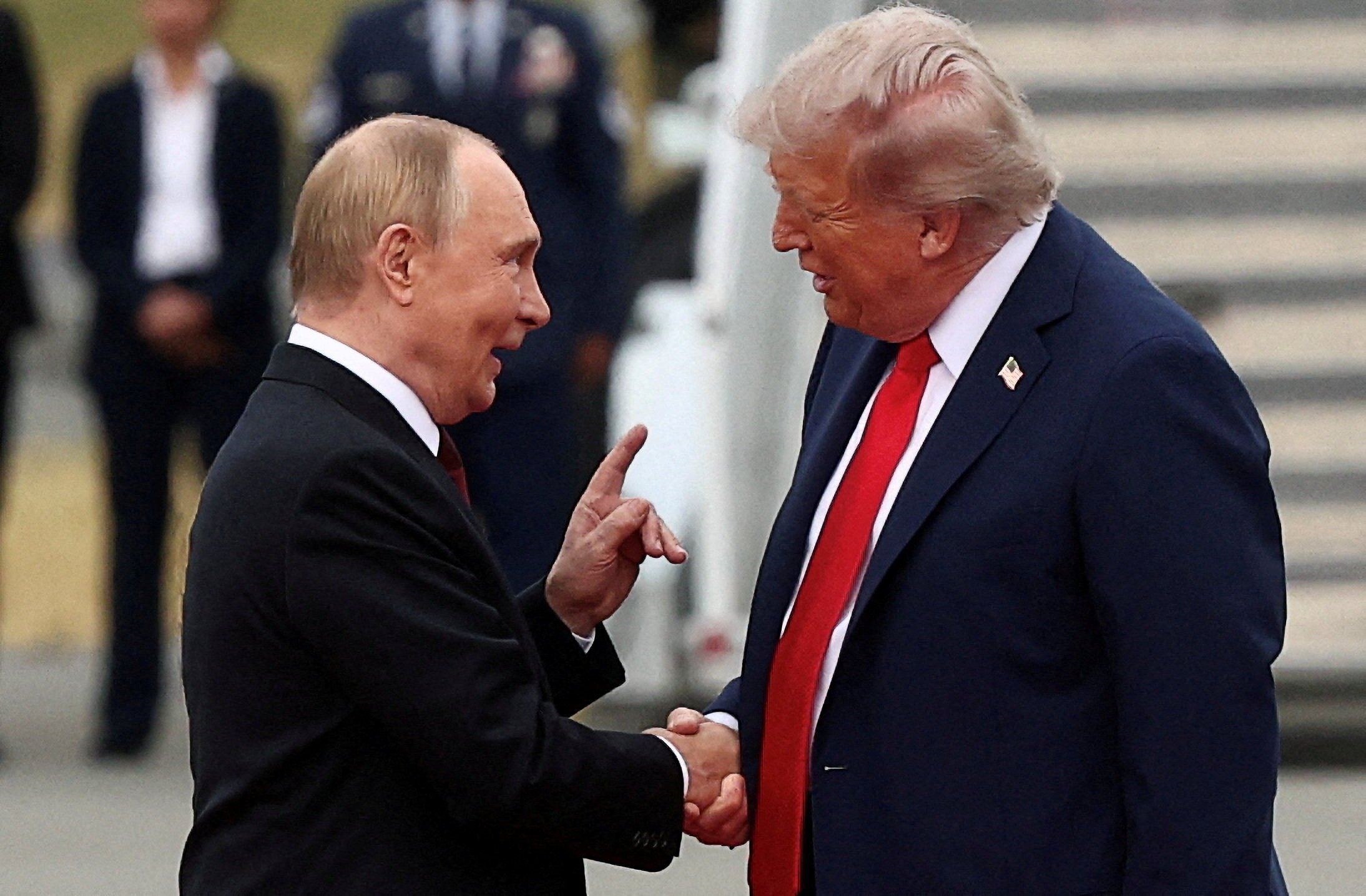 US President Donald Trump shakes hand with Russian President Vladimir Putin as they meet at Joint Base Elmendorf-Richardson in Anchorage, Alaska, on Friday. Photo: Reuters