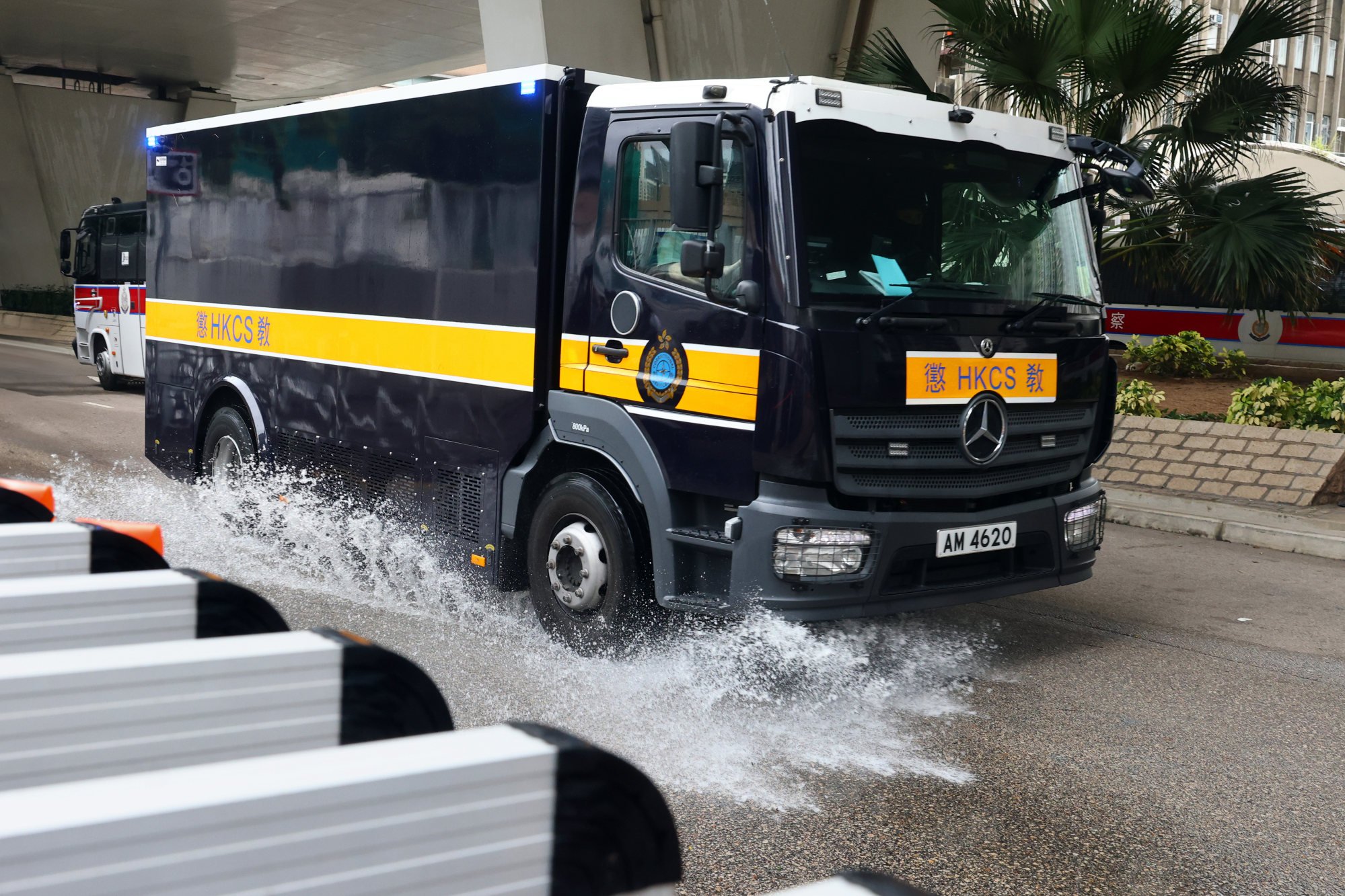 A Correctional Services Department vehicle outside West Kowloon Court. Photo: Dickson Lee