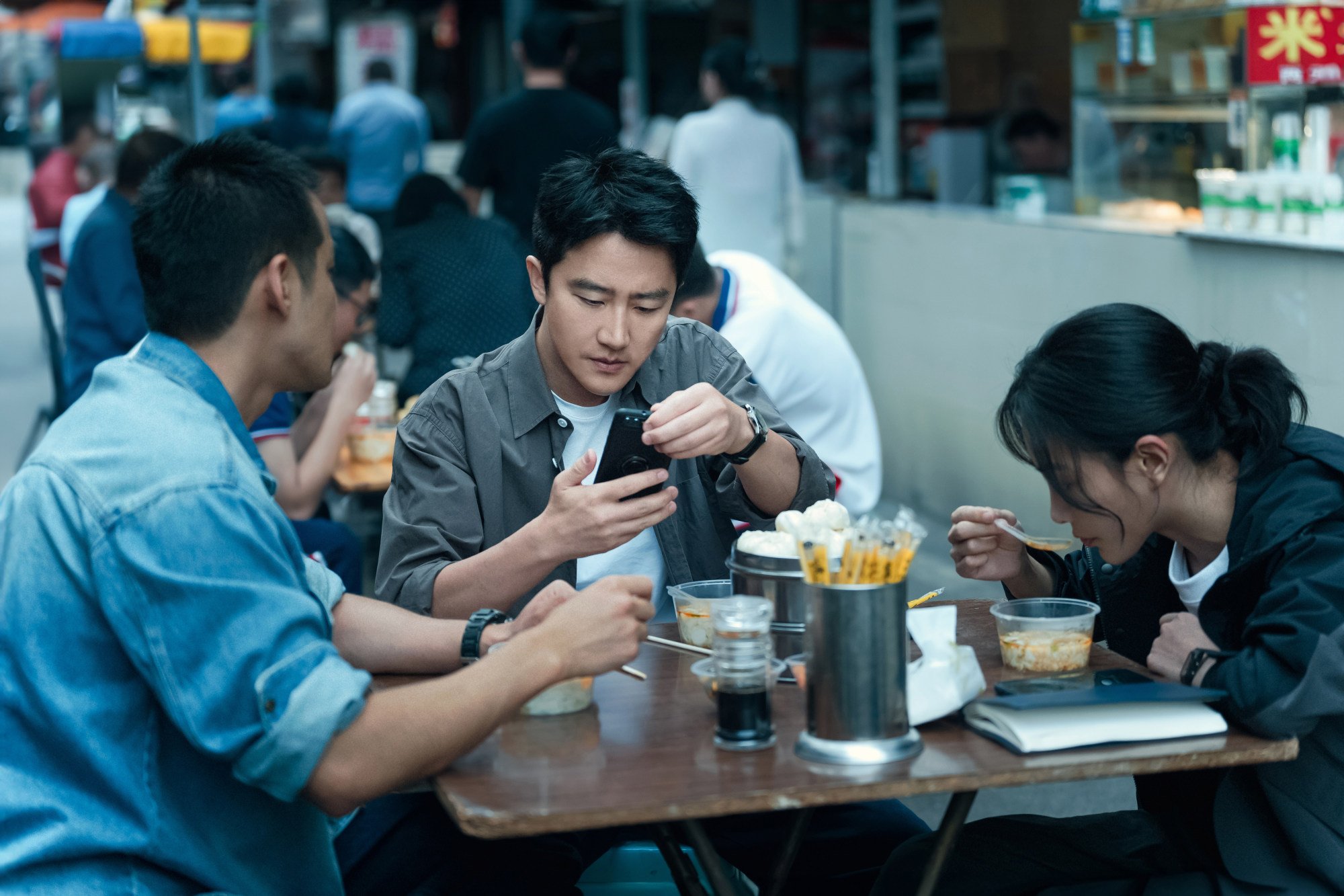 Huang Xuan (centre) in a still from Malice.