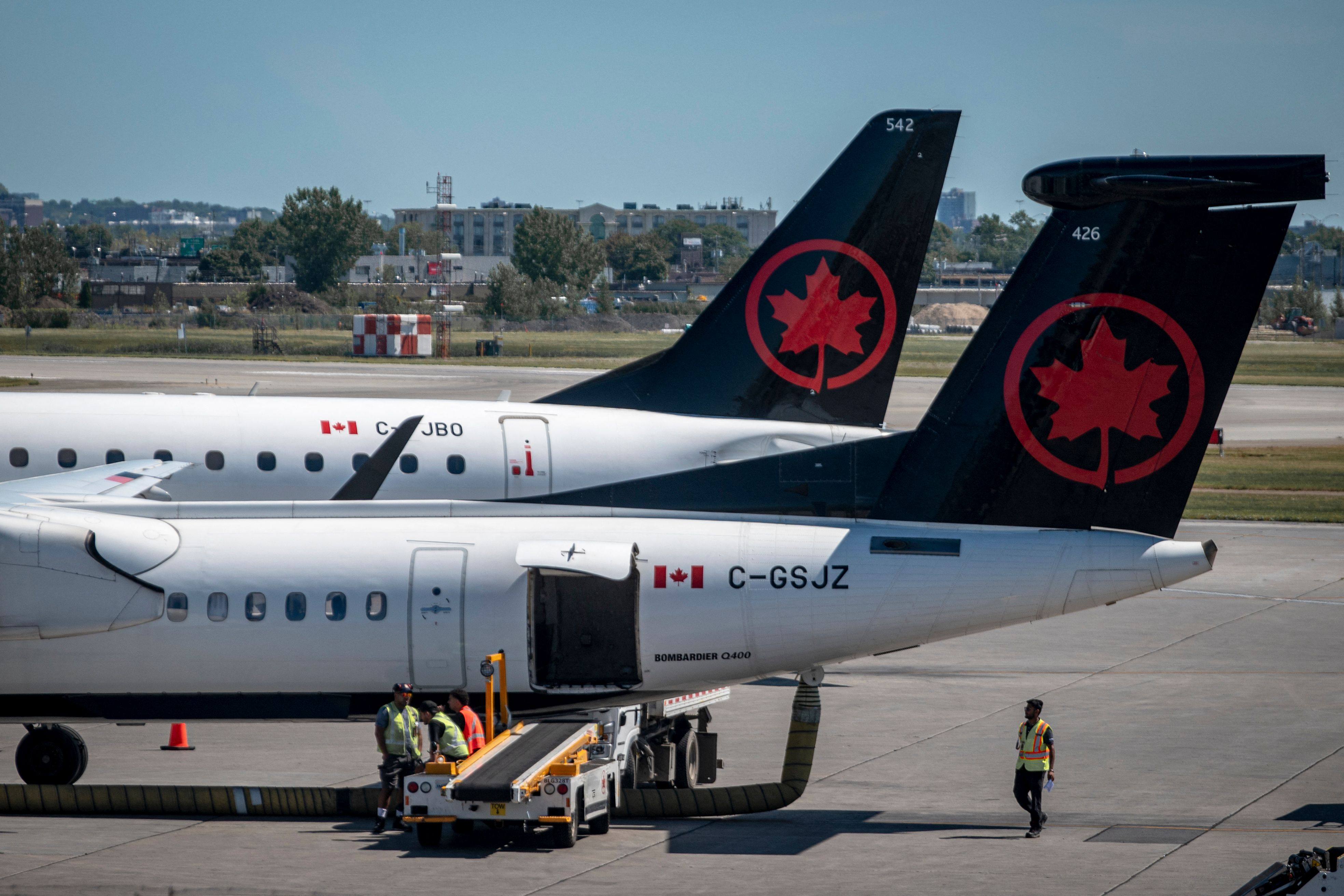 Two Air Canada planes are seen on the tarmac of the Pierre-Elliot Trudeau Airport in Montreal, Quebec, Canada, on August 15. Photo: AFP