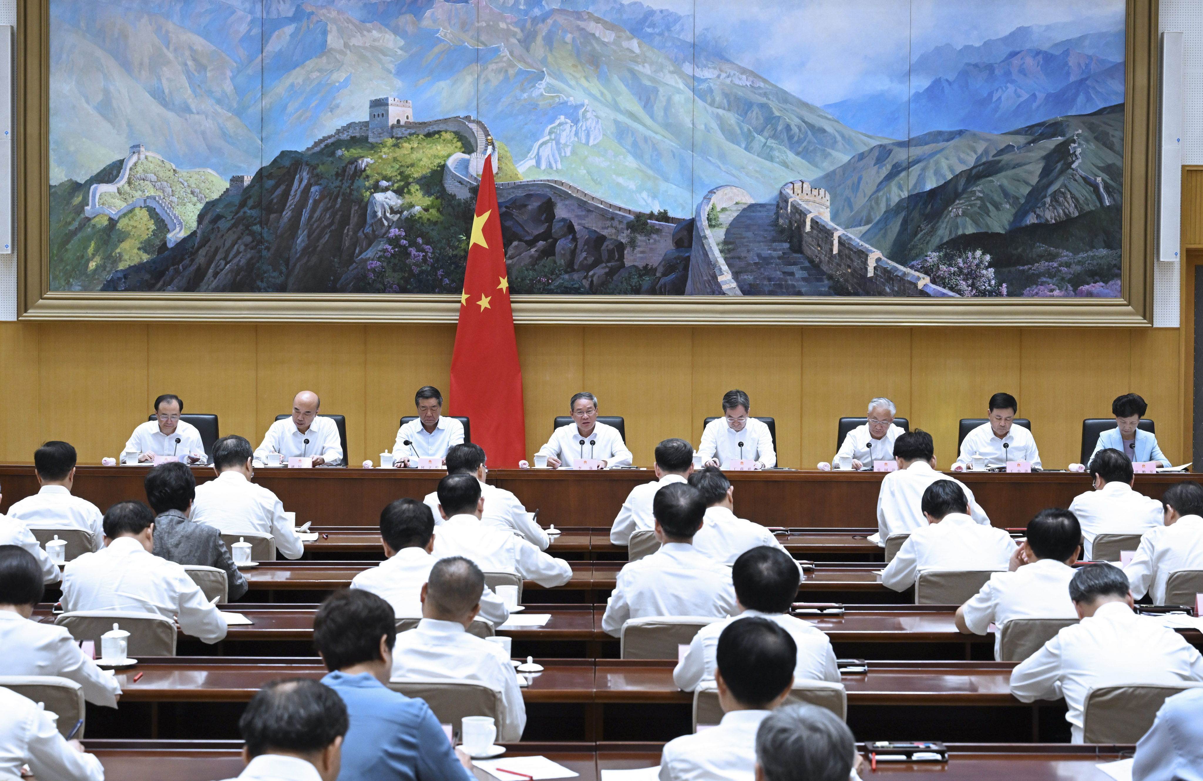 Chinese Premier Li Qiang chairs a meeting of the State, China’s cabinet, on Monday. Li called for more action to boost consumption and investment, as China strives to overcome growing economic headwinds. Photo: Xinhua