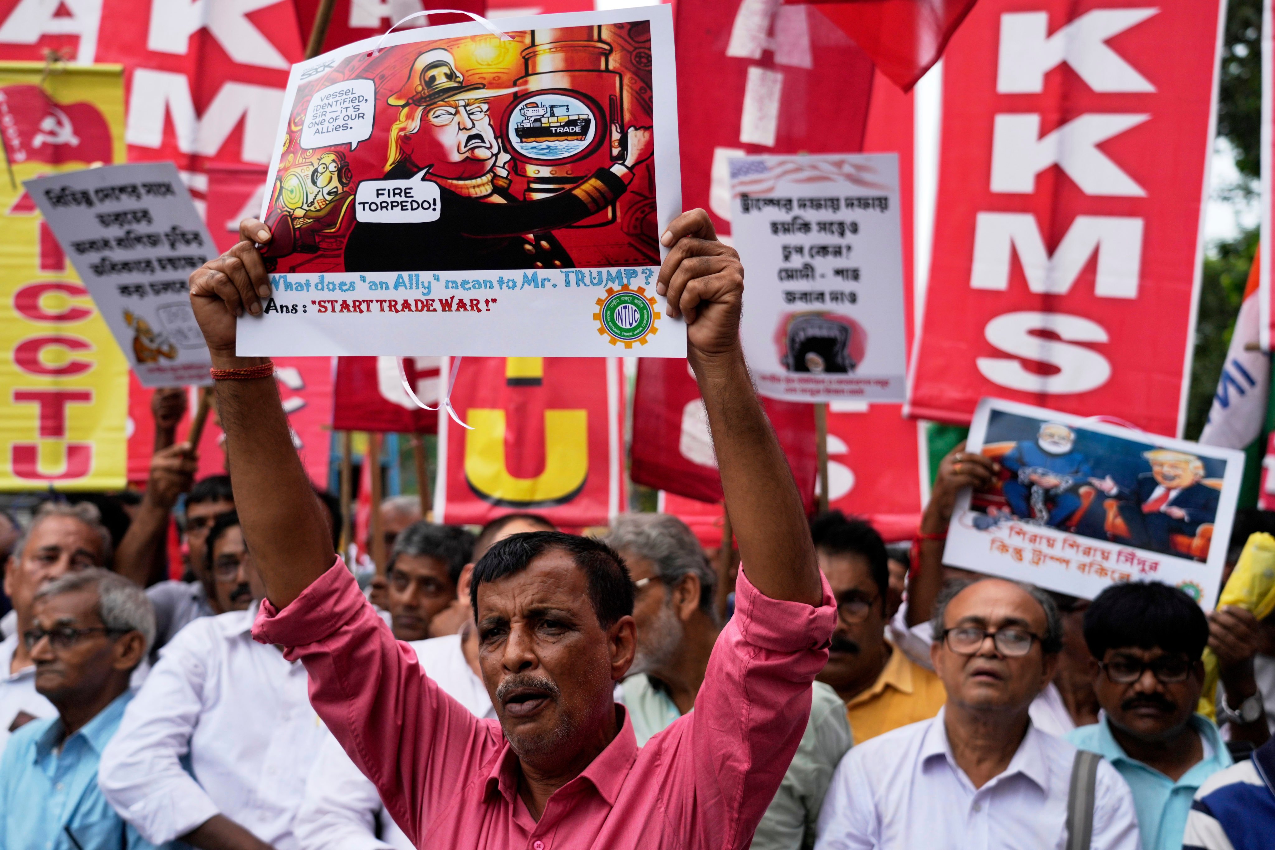 Activists head towards the US Consulate during a protest rally against President Donald Trump’s tariffs, in Kolkata, India, on August 13. Photo: AP