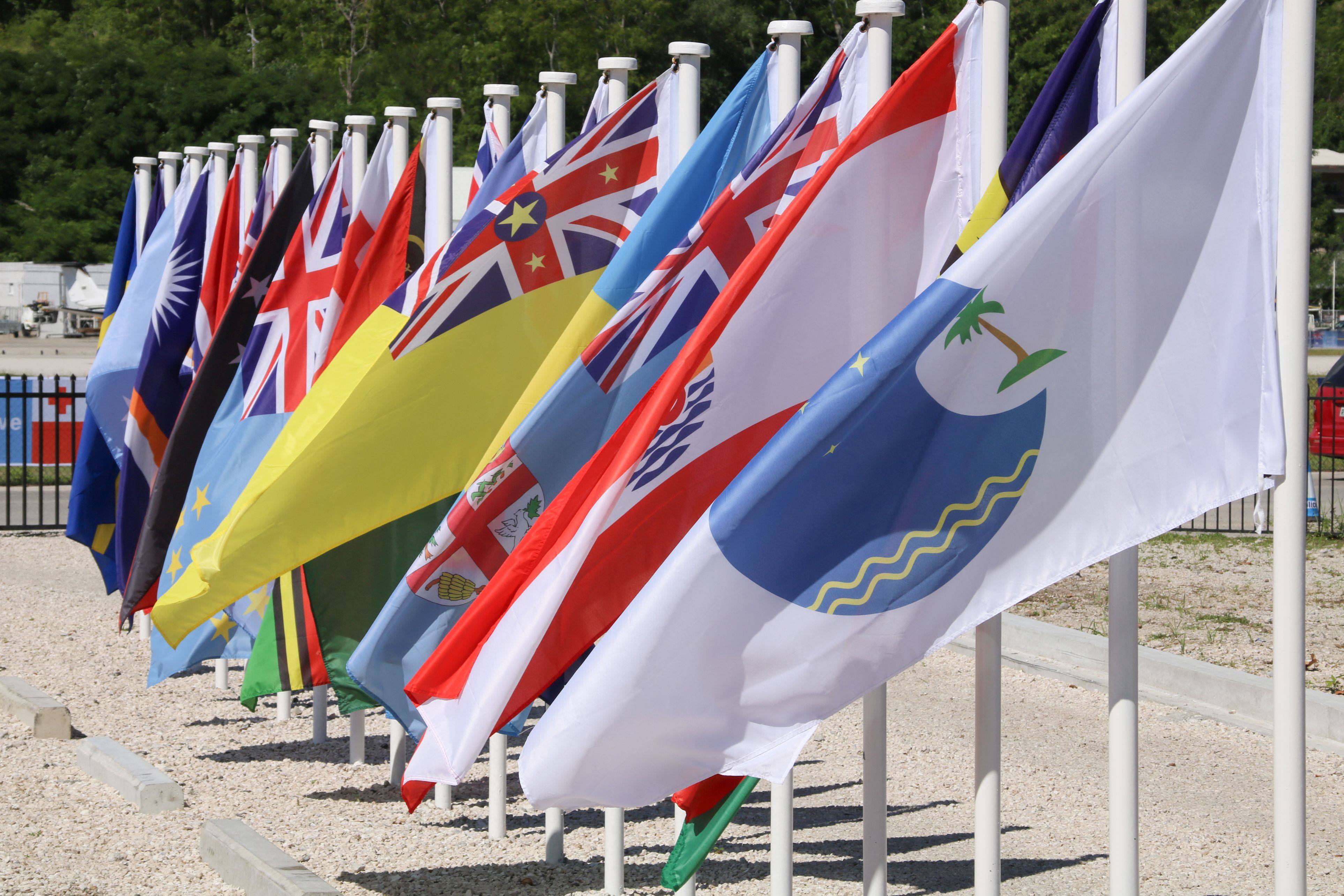 Flags from Pacific nations are seen on the last day of a Pacific Islands Forum in 2018. Photo: AFP