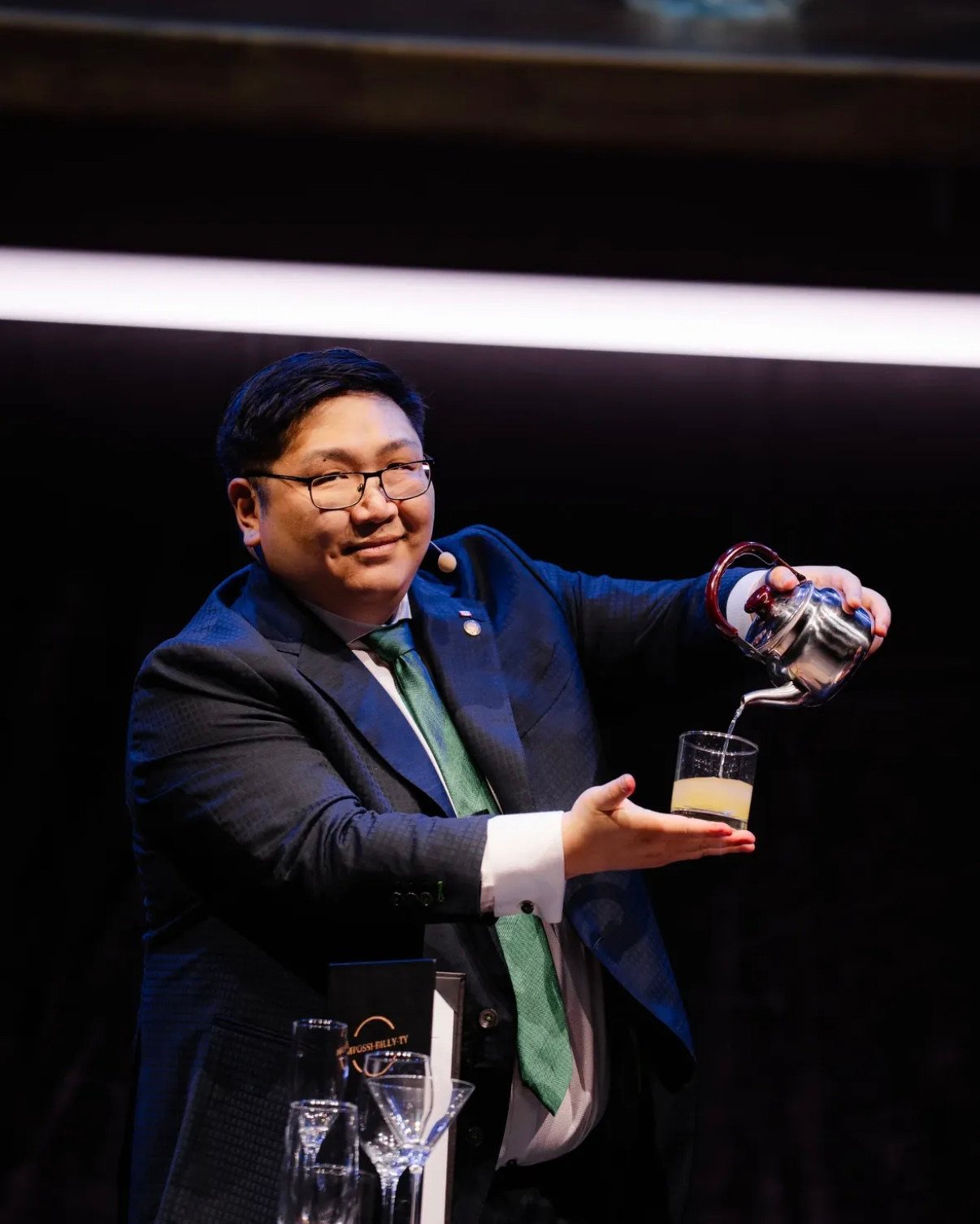 Canadian magician Billy Hsueh performs his take on the Think a Drink beverage-pouring trick at the 2025 Fism Championship of Magic in Italy. The illusionist says his goal is to make sure those who watch him have fun. Photo: Billy Hsueh