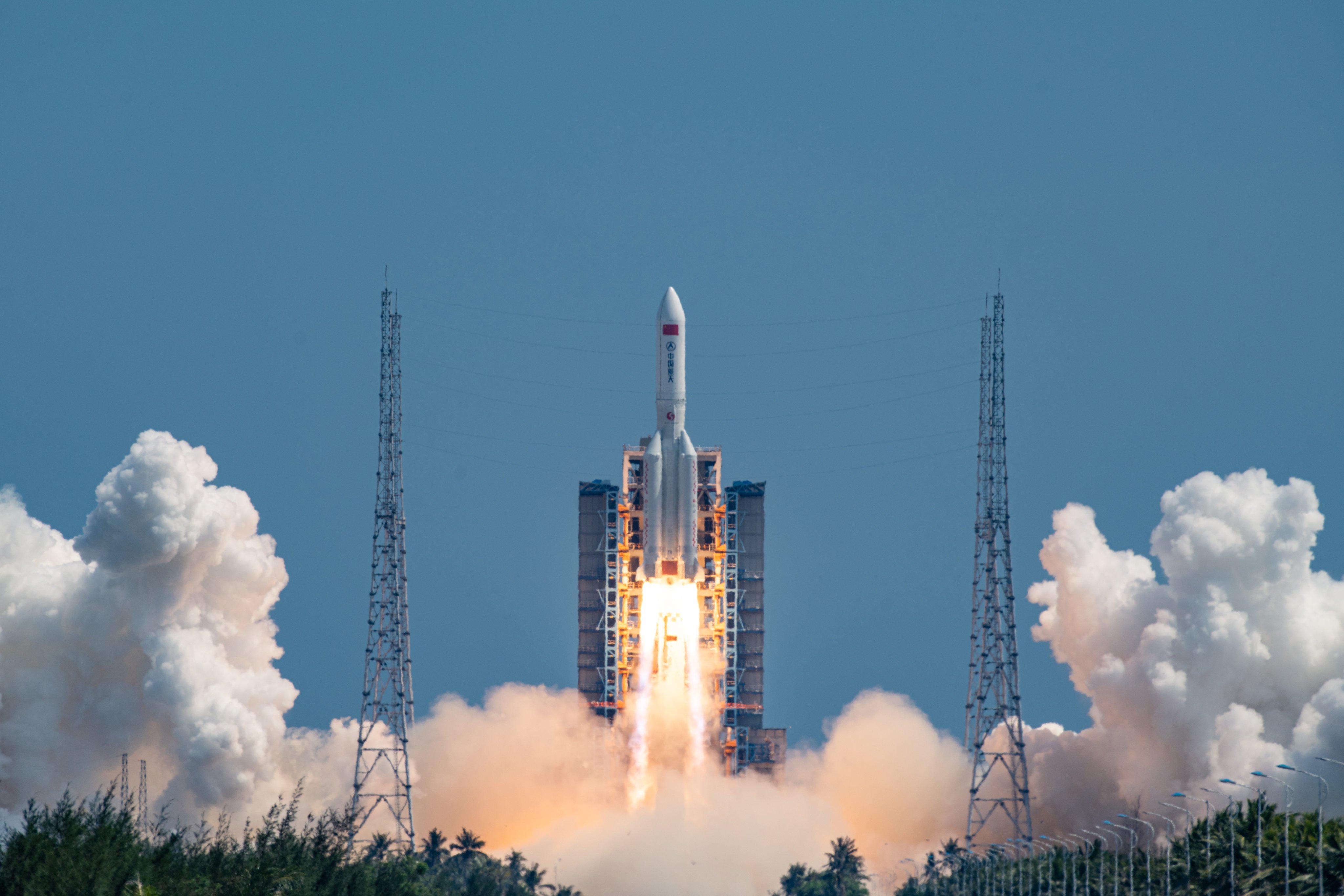 A Long March rocket carrying a group of satellites to a low-Earth orbit blasts off from Wenchang, Hainan province, on August 13. Photo: Xinhua