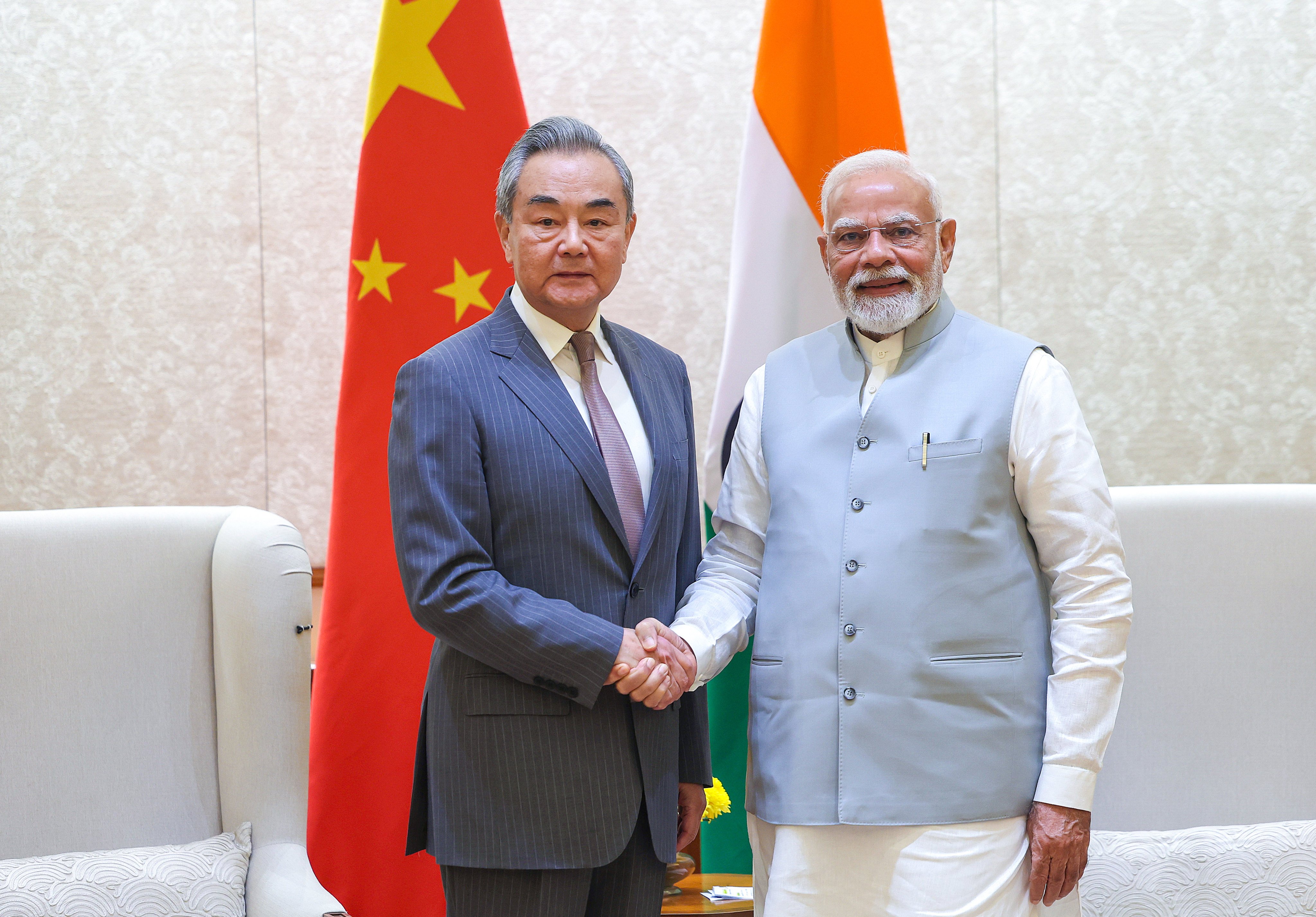 Chinese Foreign Minister Wang Yi with Indian Prime Minister Narendra Modi in New Delhi, India, on August 19. Photo: EPA/Press Information Bureau