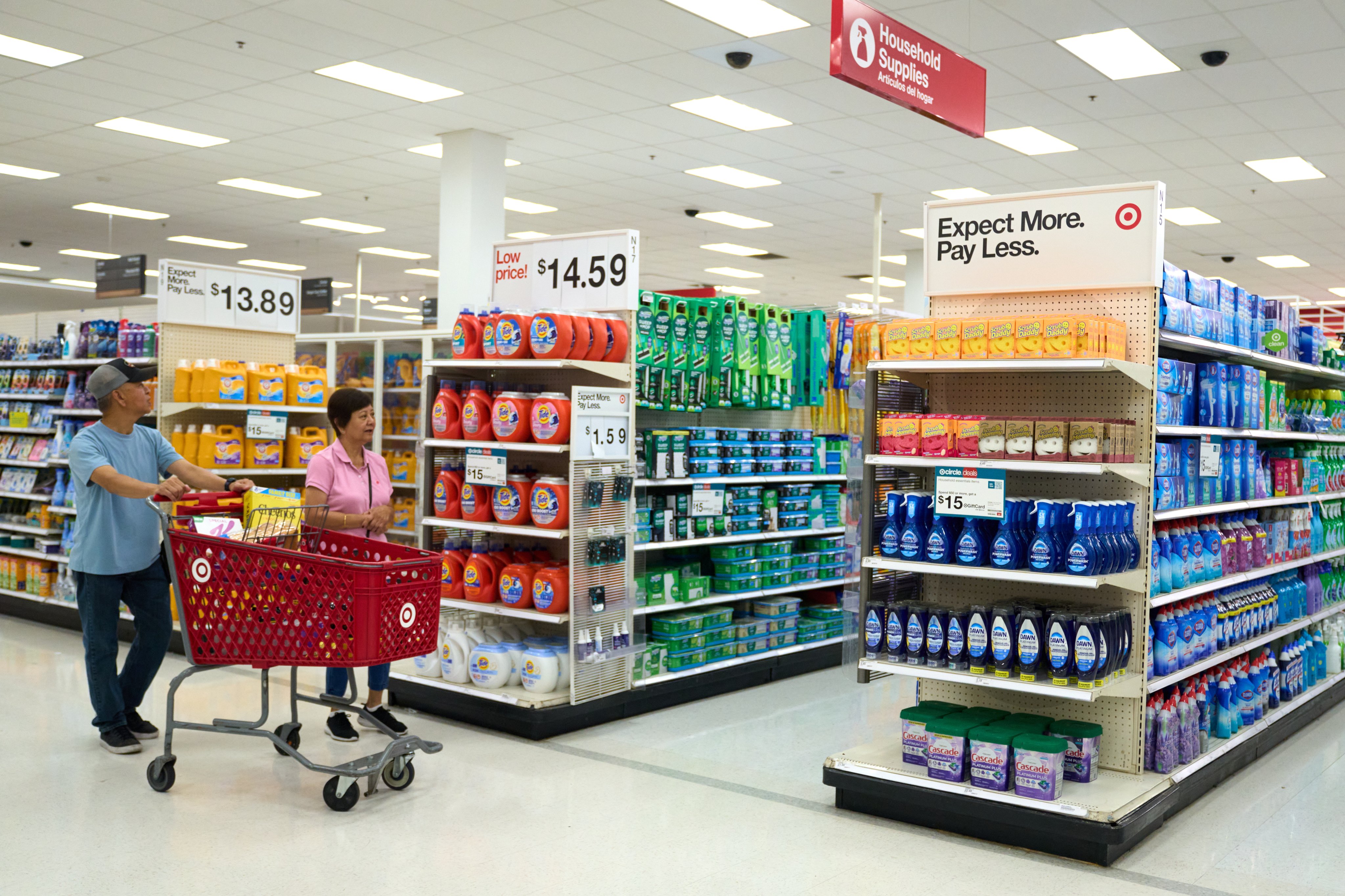 People walk past Procter & Gamble products on sale at a store in Los Angeles on July 29. The company has announced it needs to raise prices on a quarter of the goods it sells in the US to mitigate costs faced because of the tariffs imposed by US President Donald Trump. Photo: EPA