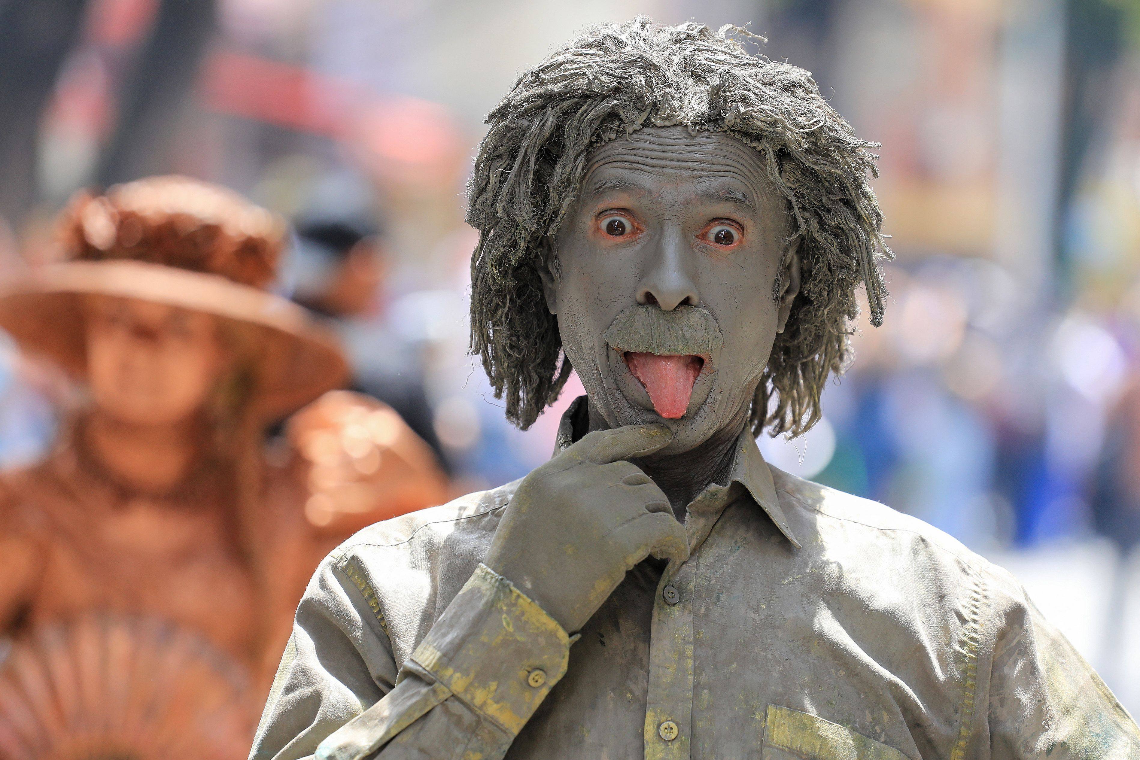 A man wearing a costume attends the World Sloth Day celebration in Itagui, Colombia. Photo: AFP