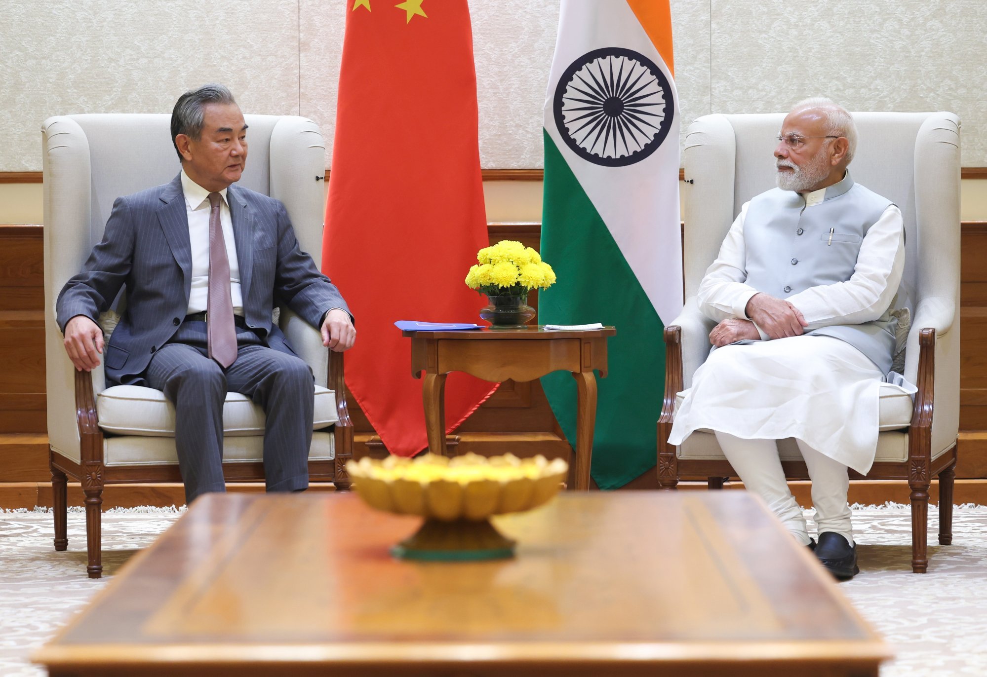 Chinese Foreign Minister Wang Yi (left) meets Indian Prime Minister Narendra Modi on Tuesday in New Delhi. Photo: EPA