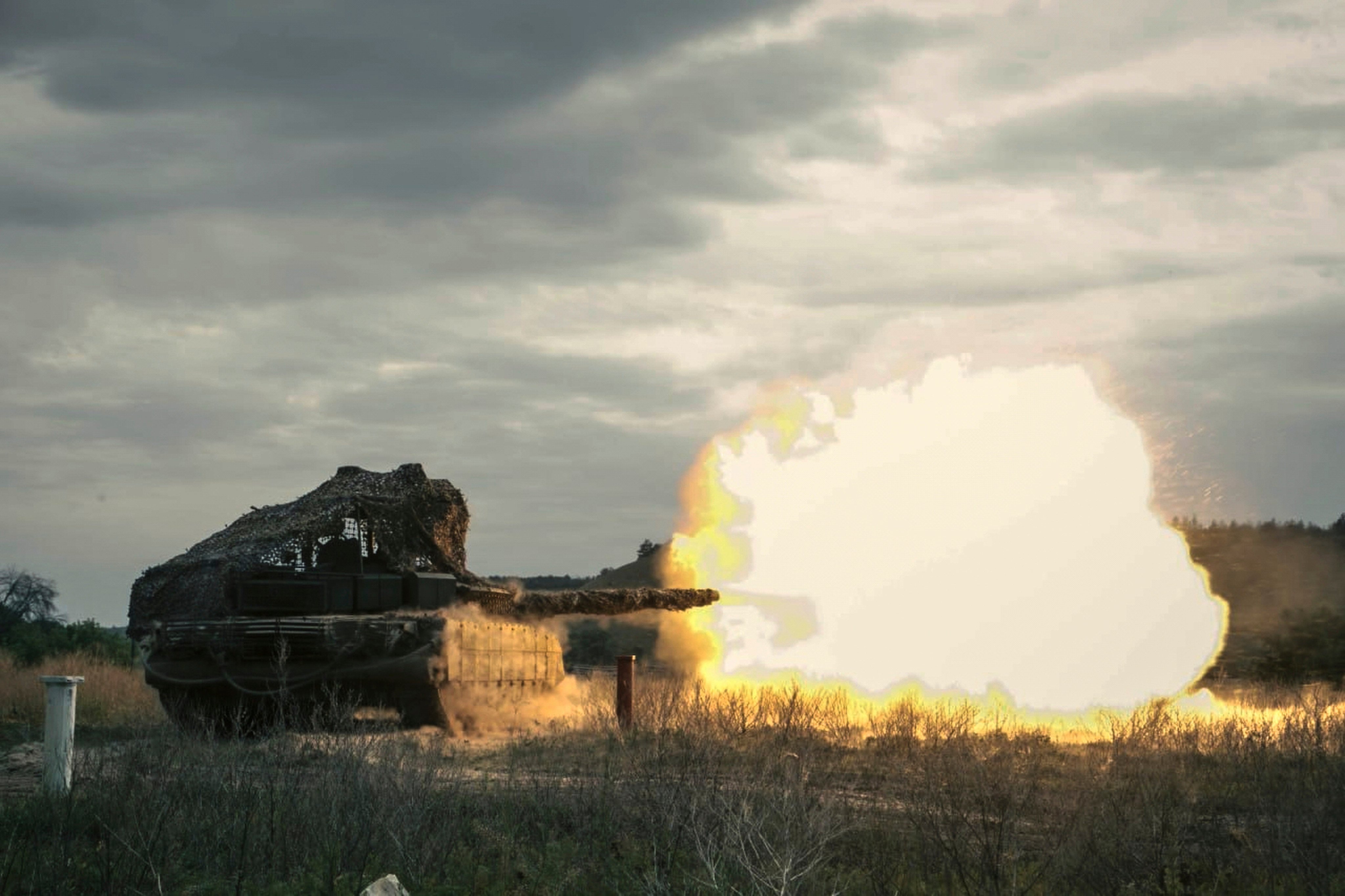 A Russian tank fires during a training session at an undisclosed location in Ukraine on August 15. Photo: Russian Defence Ministry Press Service via AP