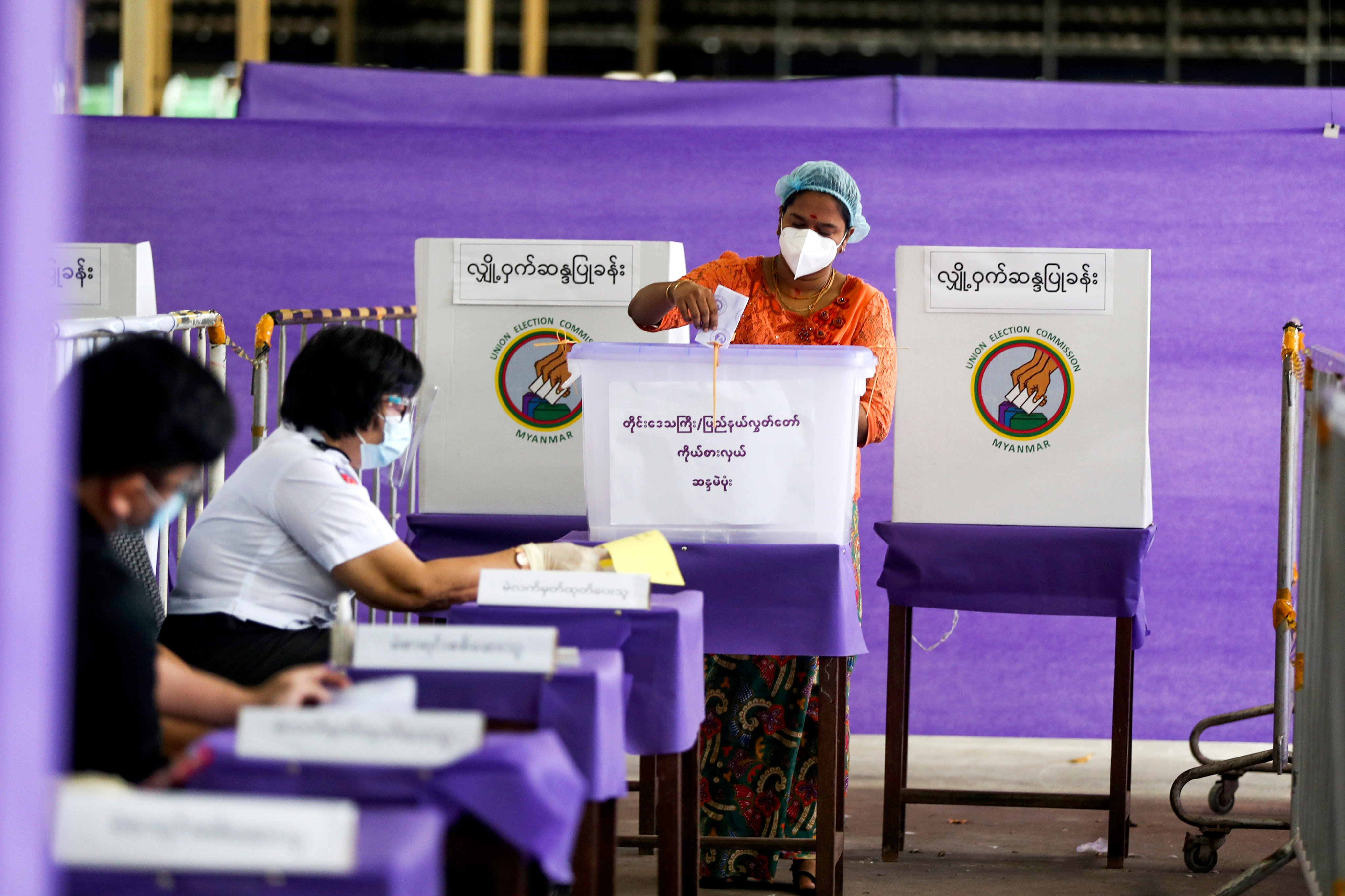 A voter casting her ballot at a polling station on November 8, 2020, in Yangon. Myanmar’s next election is slated to begin on December 28, with additional stages to follow. Photo: AP