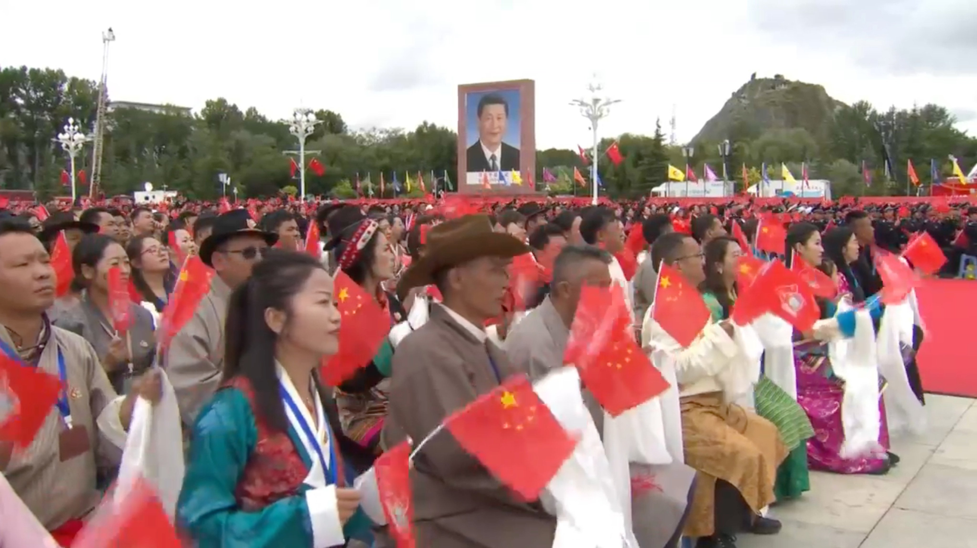 More than 20,000 people gathered for a ceremony in Lhasa on Thursday morning to celebrate the 60th anniversary of the founding of the Tibet autonomous region in the presence of China’s leader Xi Jinping. Photo: CCTV