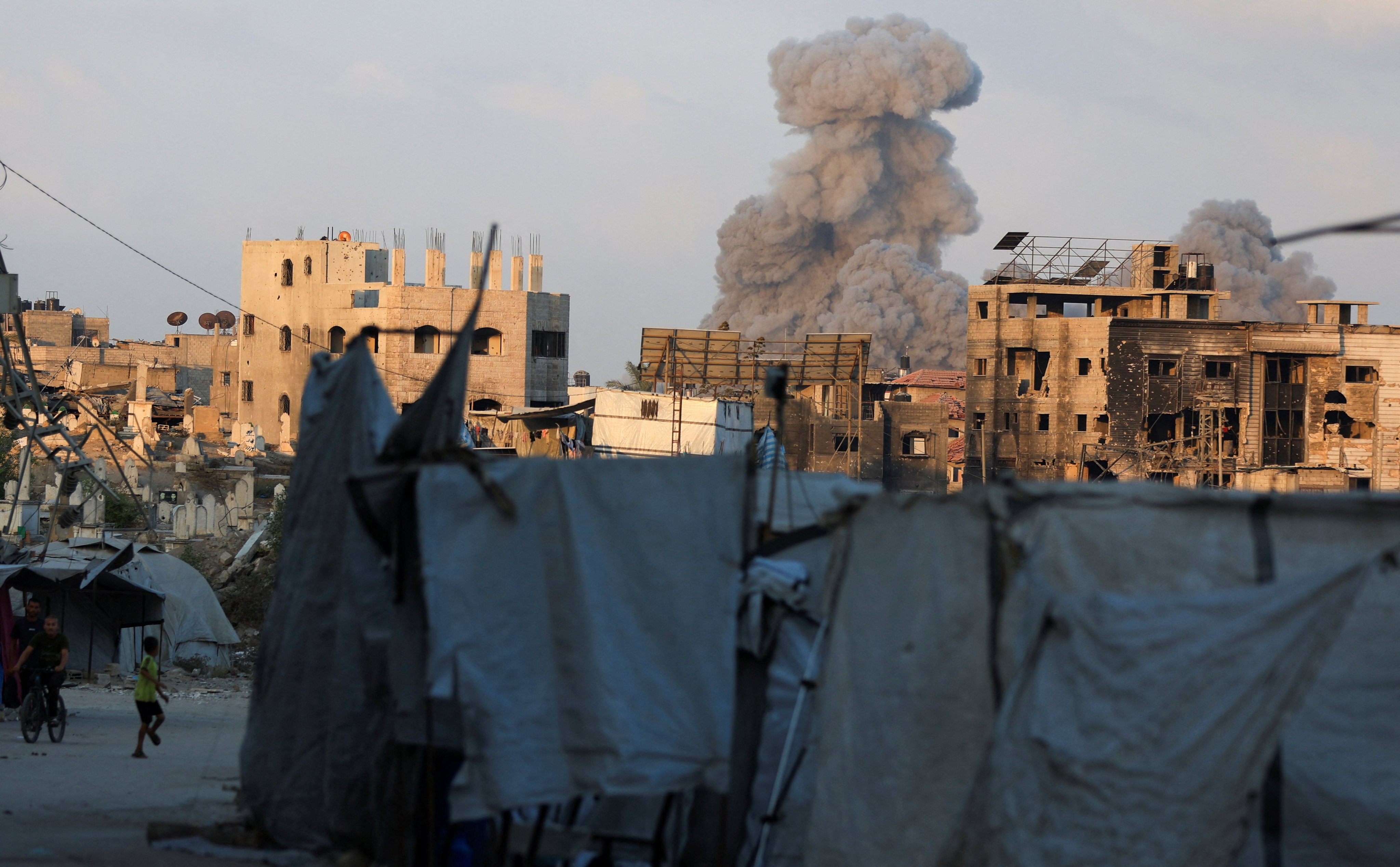Smoke rises following an Israeli strike, in Gaza City on Thursday. Photo: Reuters