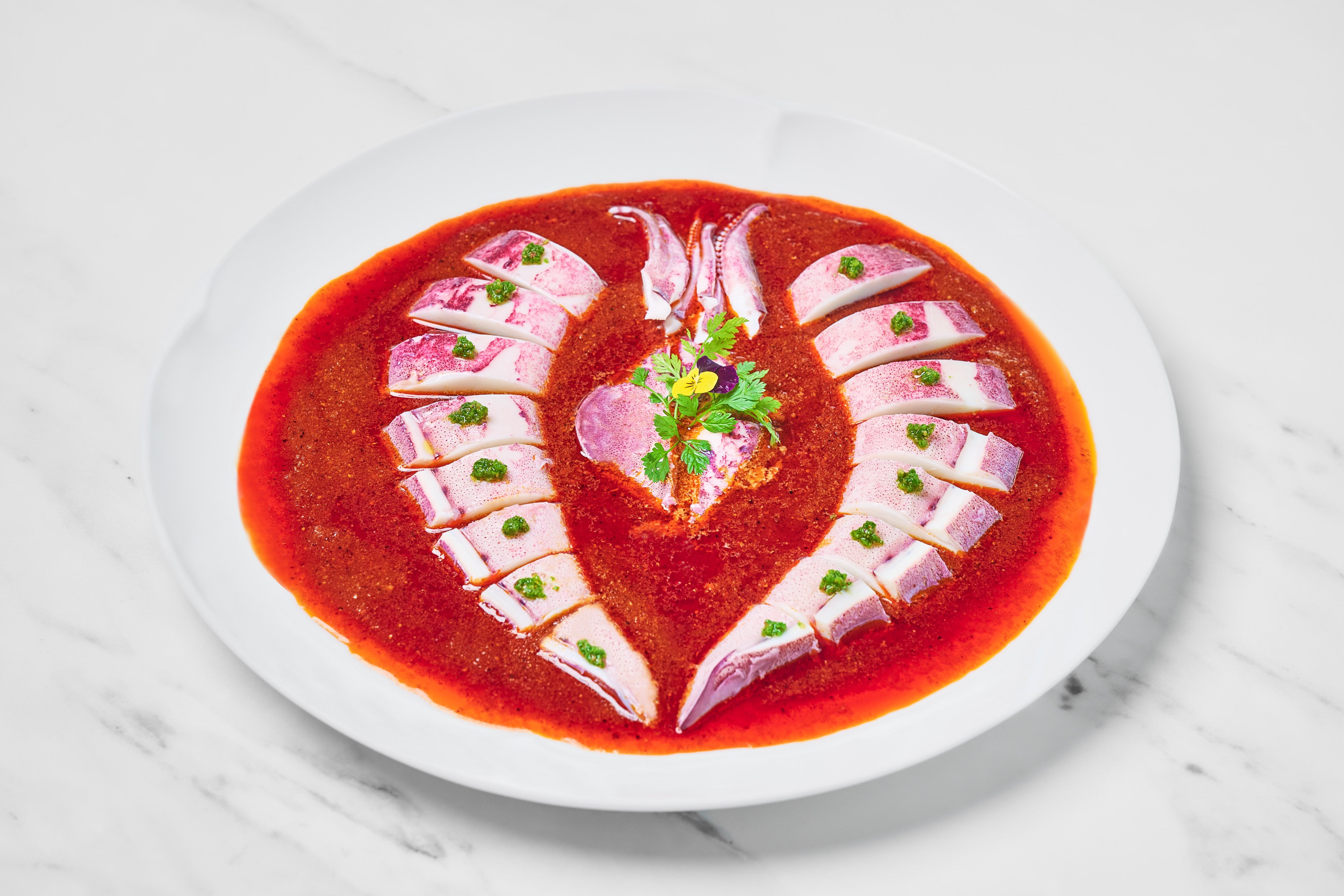 Poached Hokkaido squid with peanut and garlic with chilli oil is one of chef Albert Li’s Singapore-influenced dishes at Jin Ting Wan. Photo: Jin Ting Wan