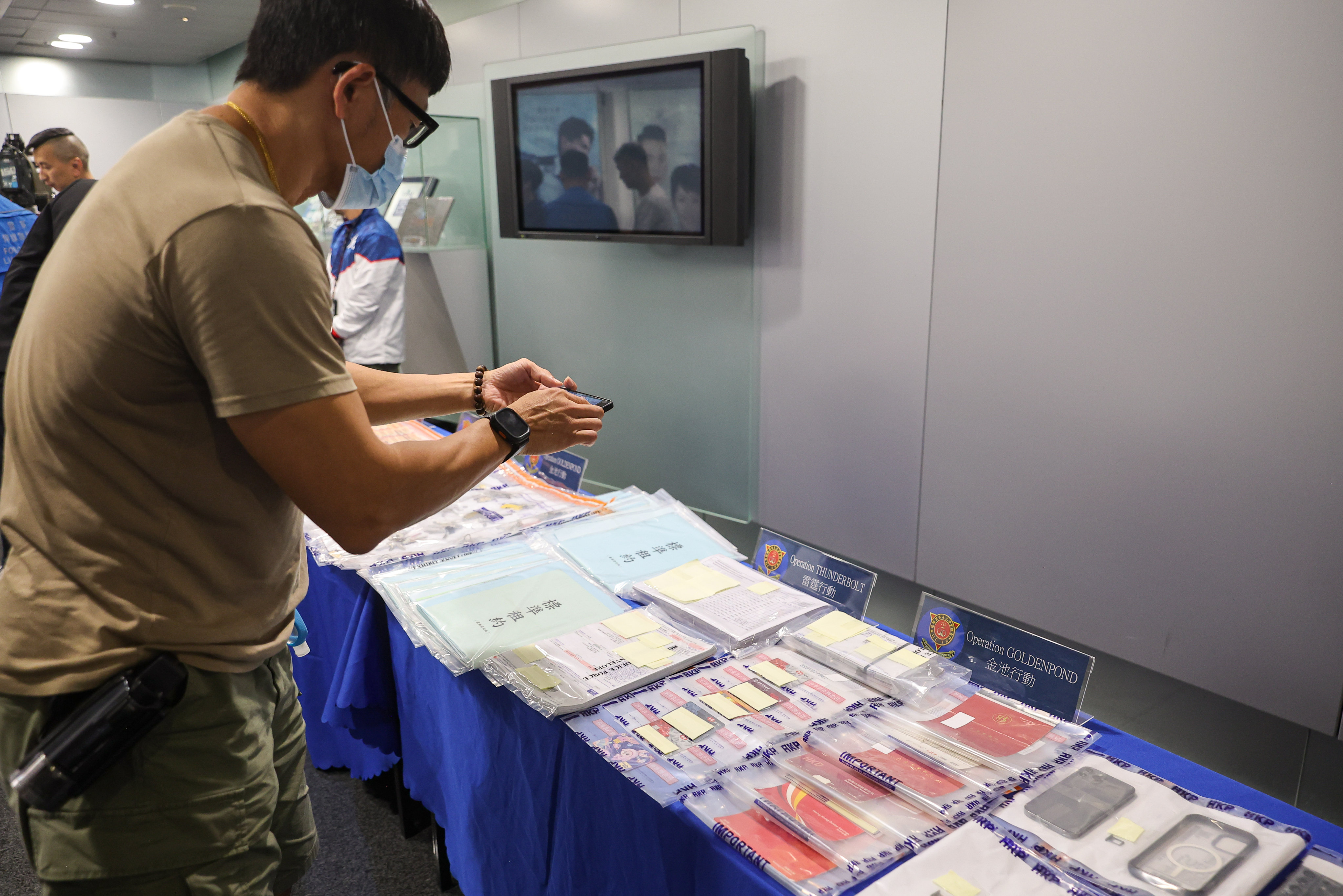 Hong Kong police display evidence seized during its joint operation with mainland Chinese authorities against a cross-border human trafficking ring. Photo: Edmond So