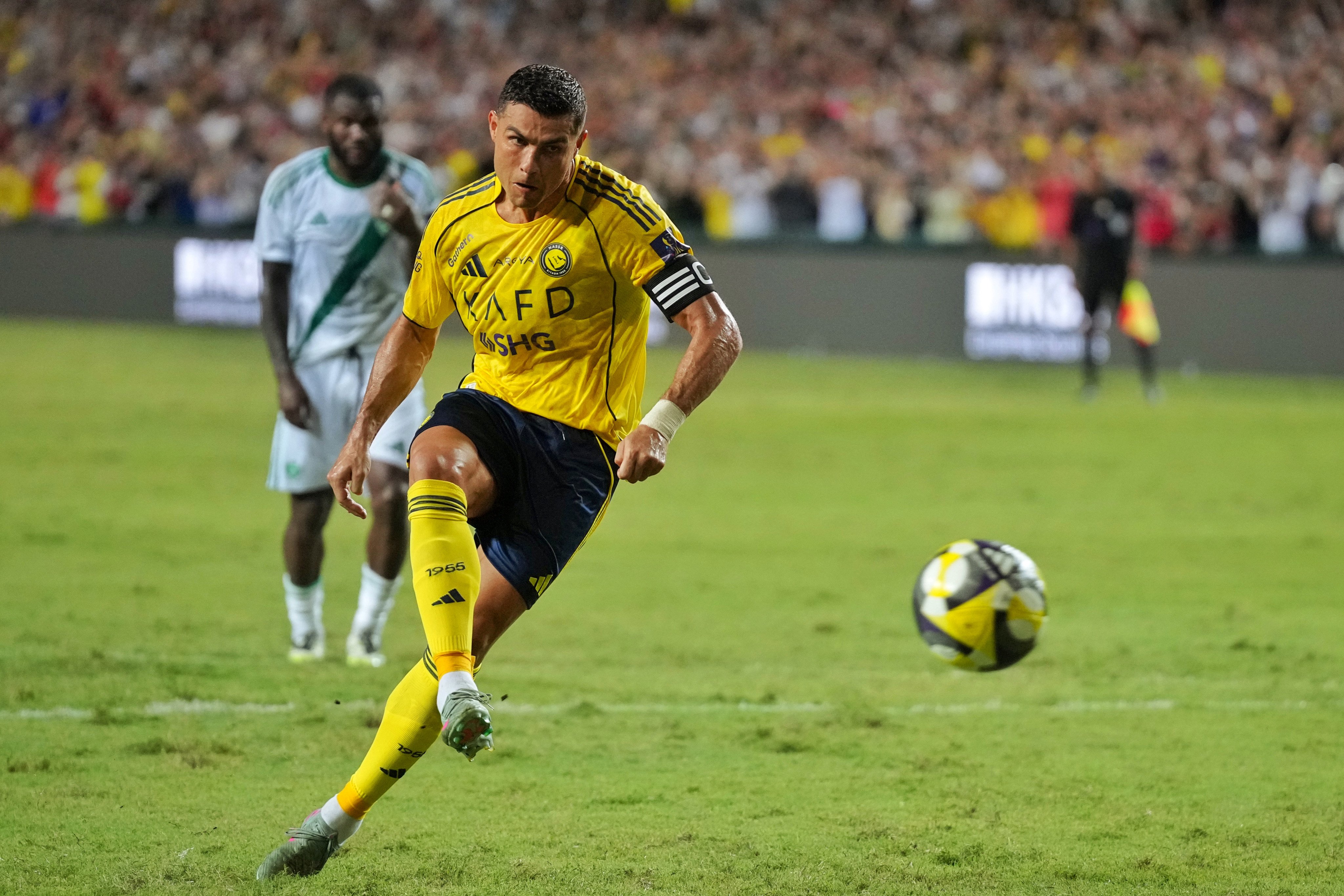 Al-Nassr’s Cristiano Ronaldo scores the first goal from the penalty spot at Hong Kong Stadium. Photo: Elson Li