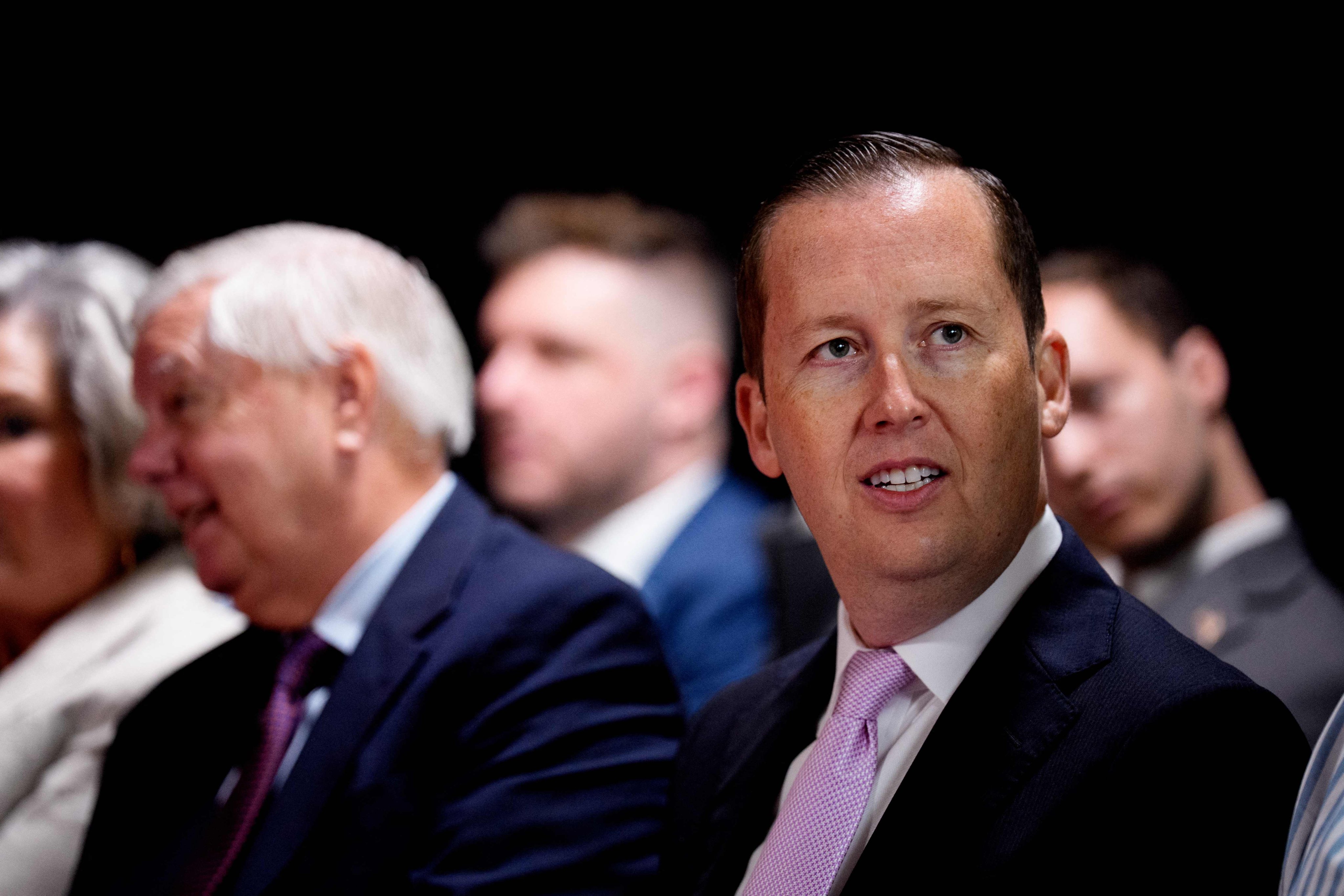 Assistant to the President Sergio Gor (right) waits before US President Donald Trump arrives for an event at the Kennedy Centre in Washington on August 13. Photo: AFP