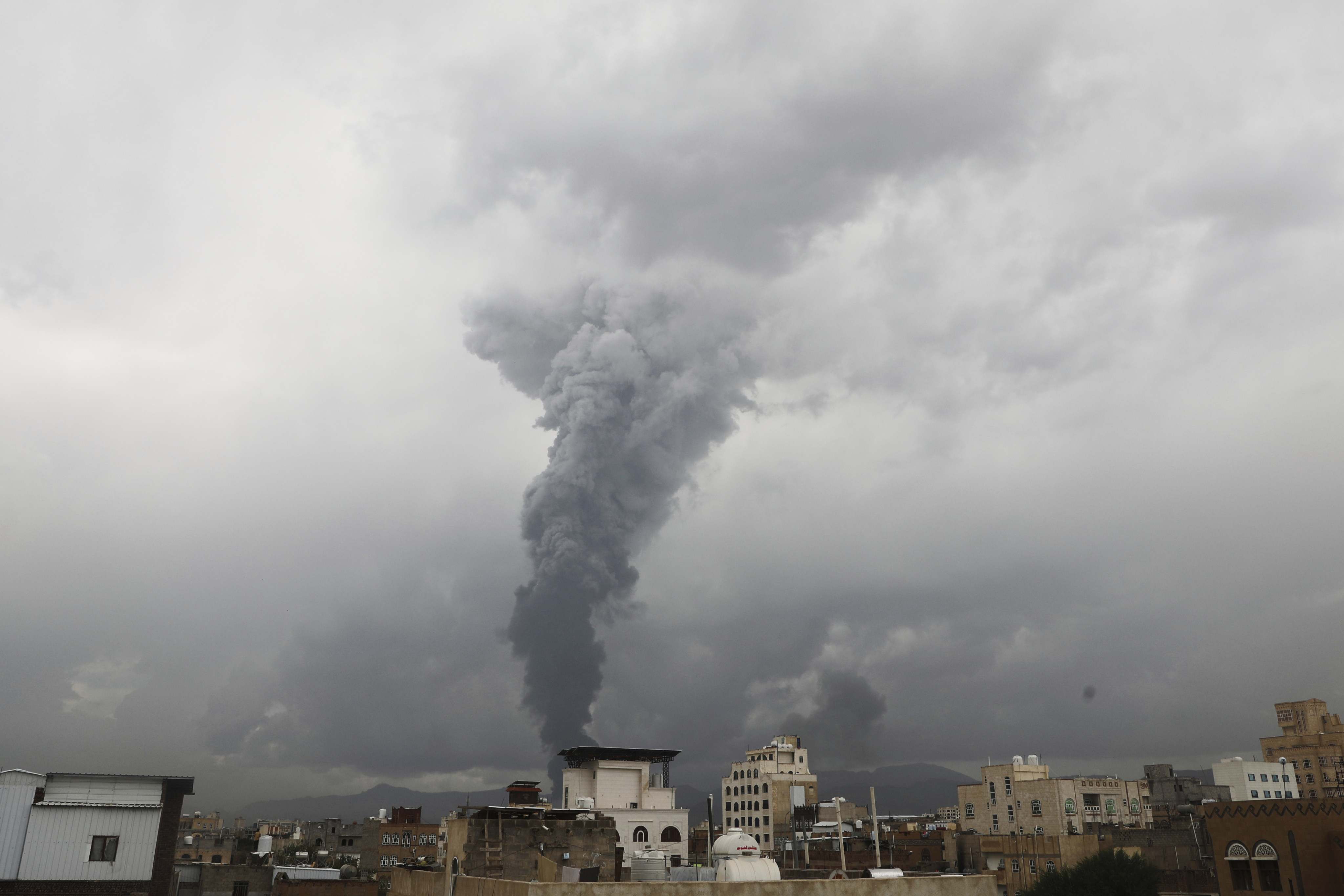 Smoke billows following Israeli airstrikes in multiple areas in Sanaa, Yemen on Sunday. Photo: AP