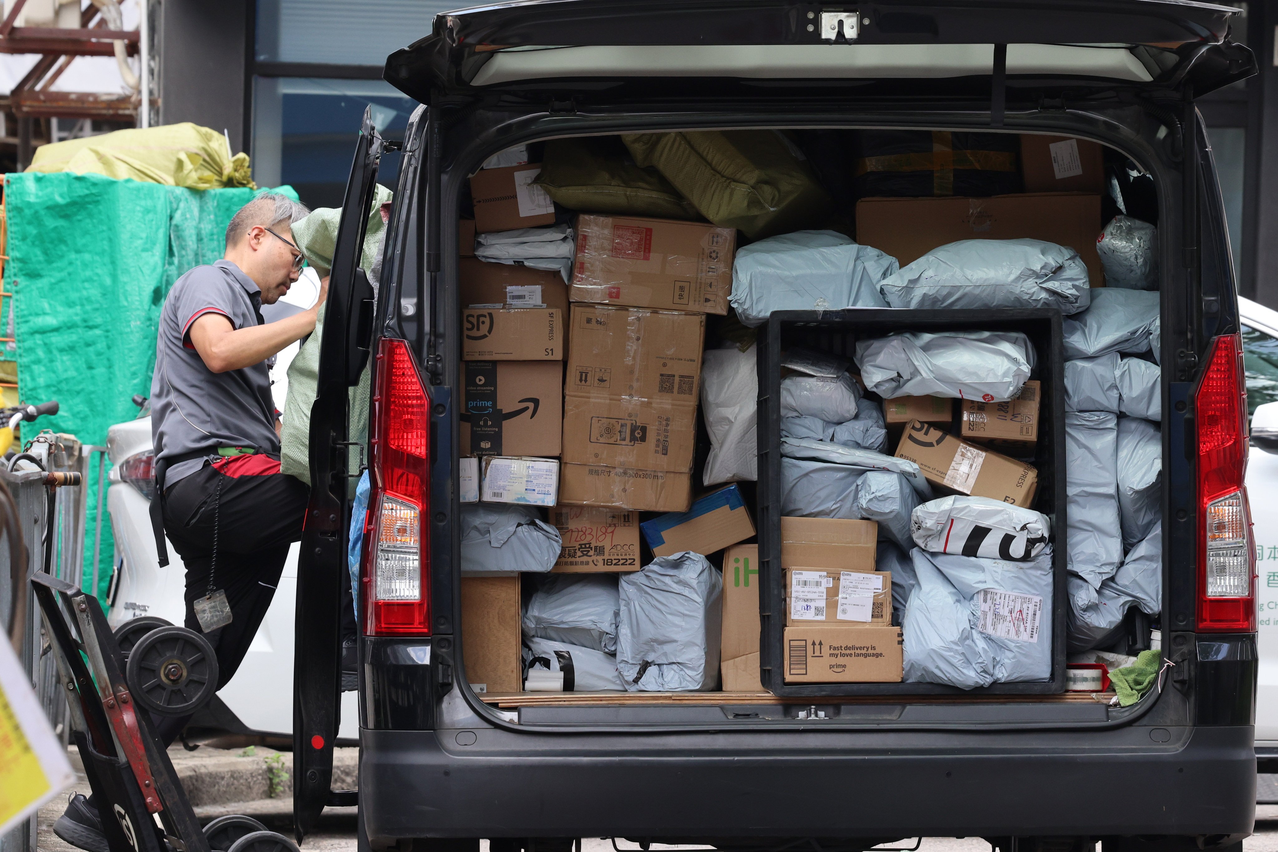 Express delivery fees have been increased in some parts of China in response to a rapid decline in prices fuelled by fierce industry competition. Photo: Jelly Tse