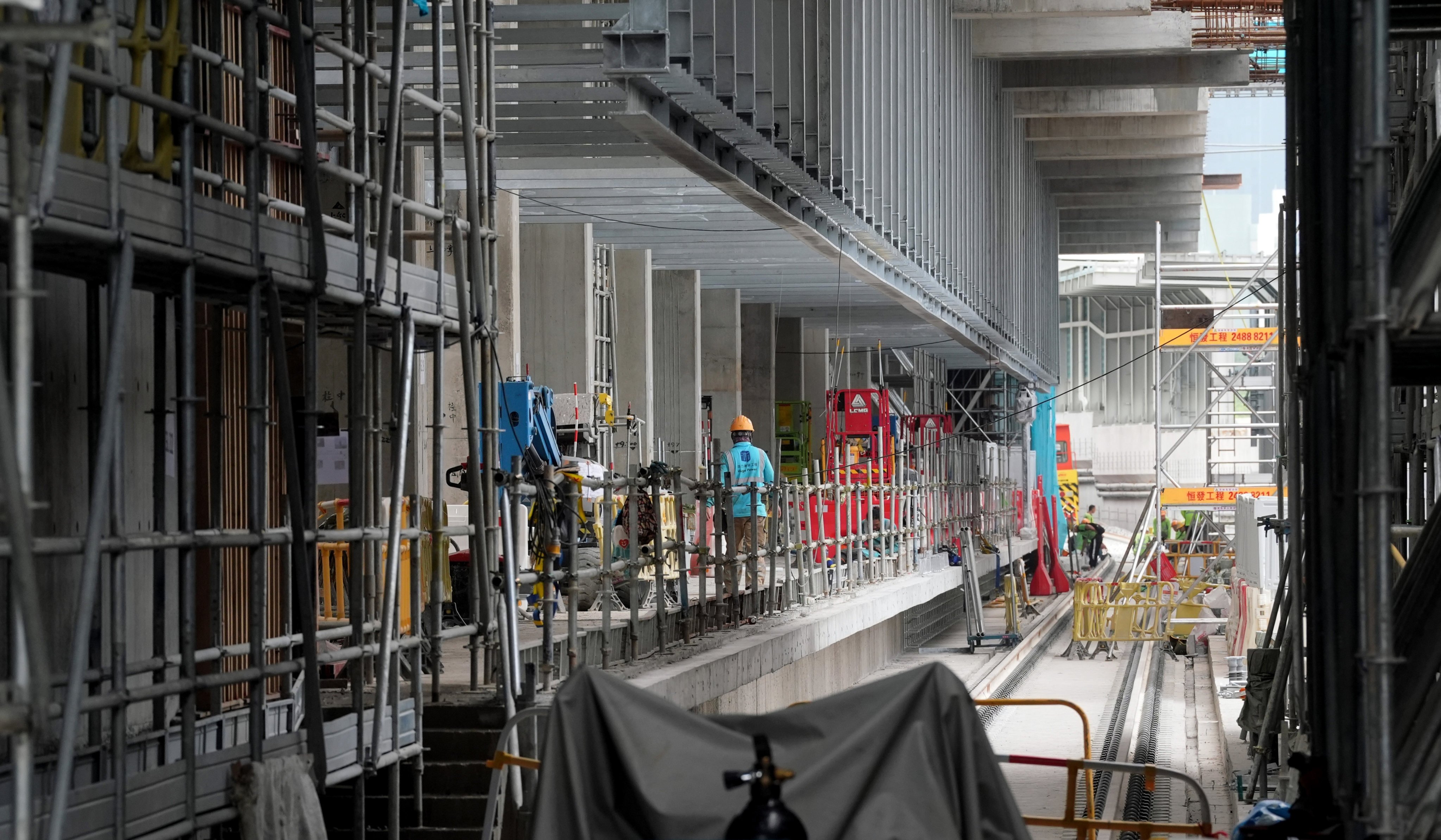 The MTR Corporation is facing growing pressure after a subcontractor allegedly procured Chinese-made tiles for the Tung Chung East station project, instead of the contract-specified German ones. Photo: Elson Li