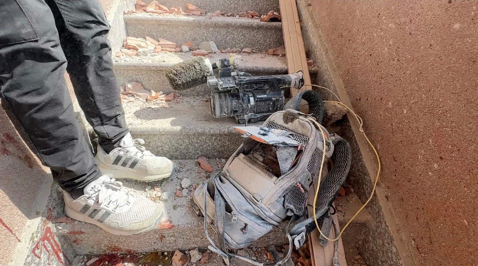 Equipment used by Palestinian cameraman, Hussam al-Masri, lies at the site where he was killed, by an Israeli strike on Monday. Photo: Reuters