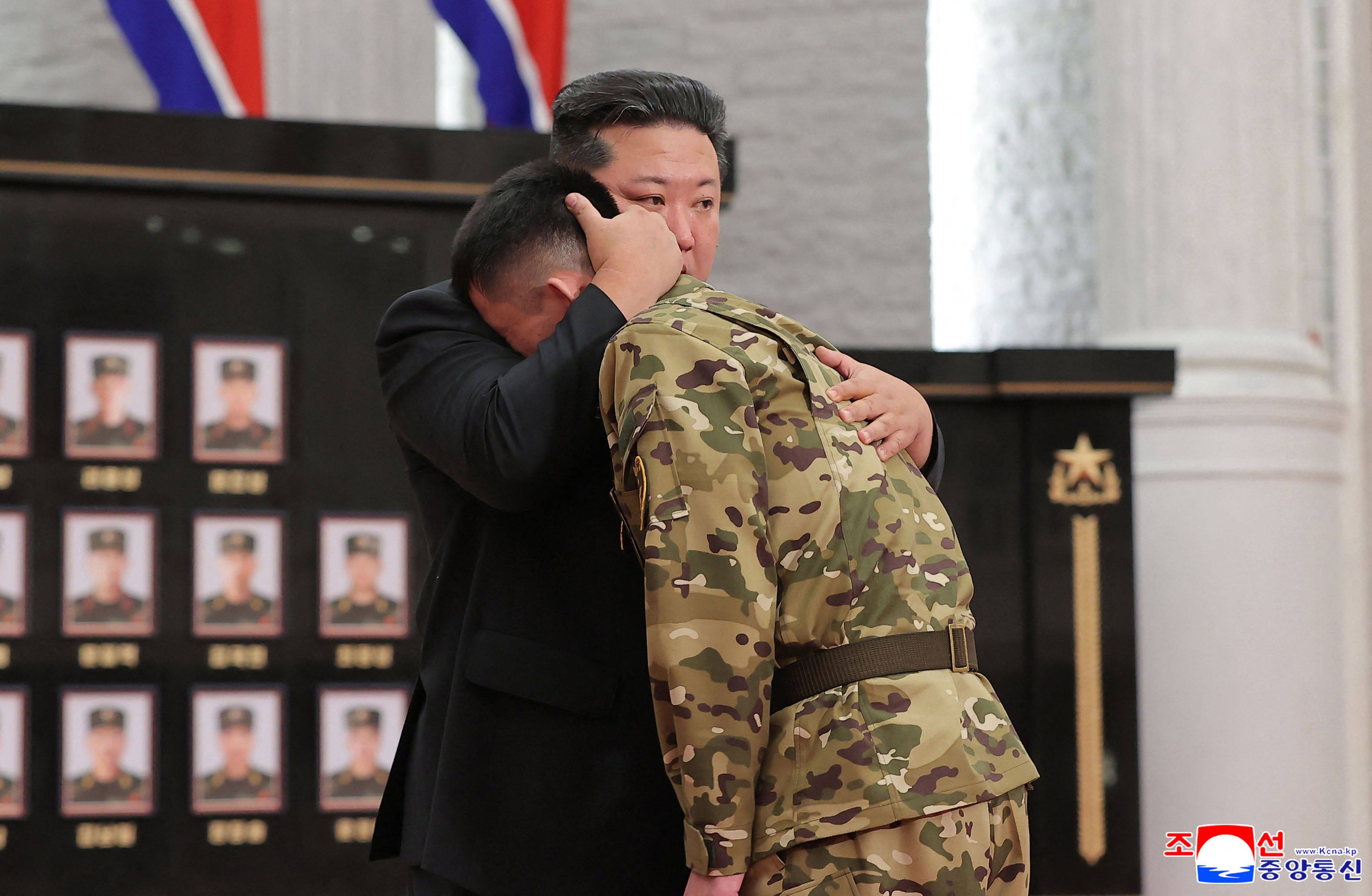 North Korean leader Kim Jong-un embraces a serviceman at the ceremony last week for troops sent to fight for Russia in its war against Ukraine. Photo: KCNA/KNS/AFP