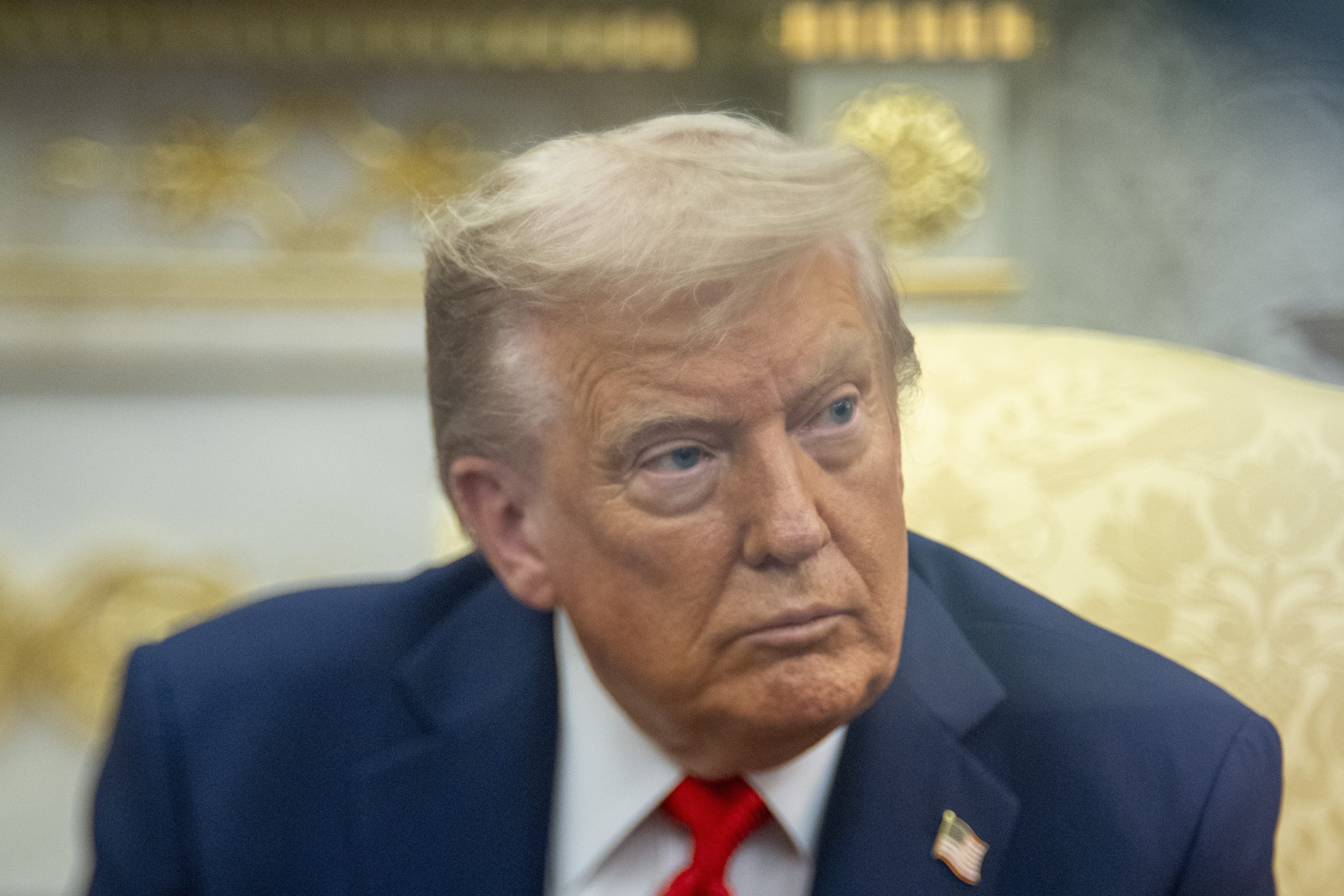 President Donald Trump in the Oval Office of the White House on August 25. Photo: AP