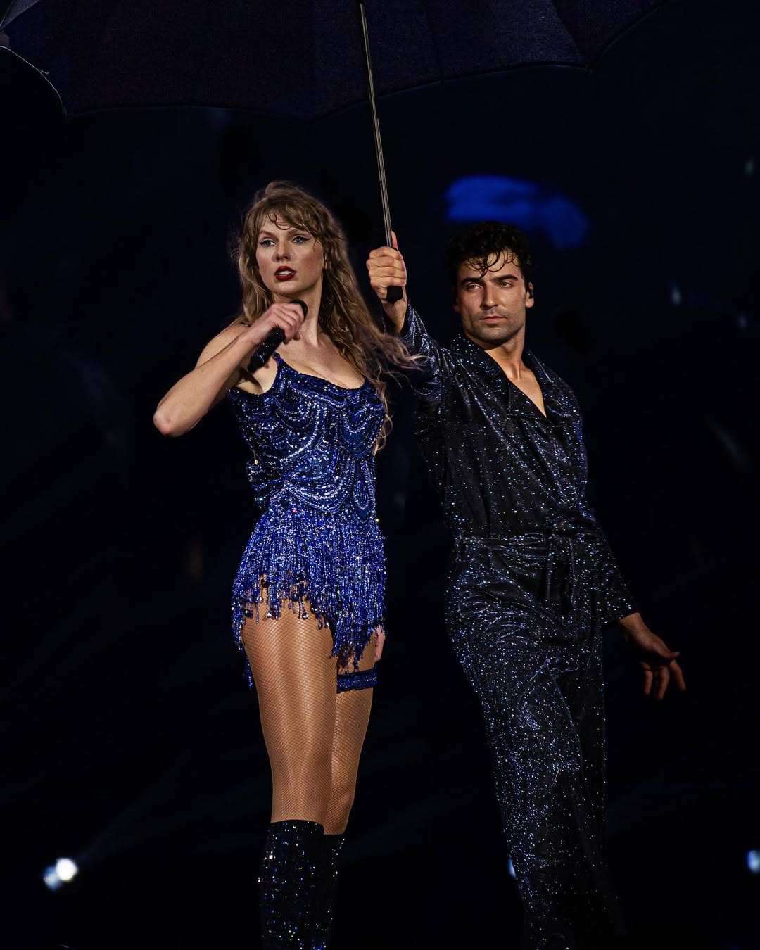 Jan Ravnik dancing onstage with Taylor Swift during The Eras Tour. Photo: @janravnik/Instagram