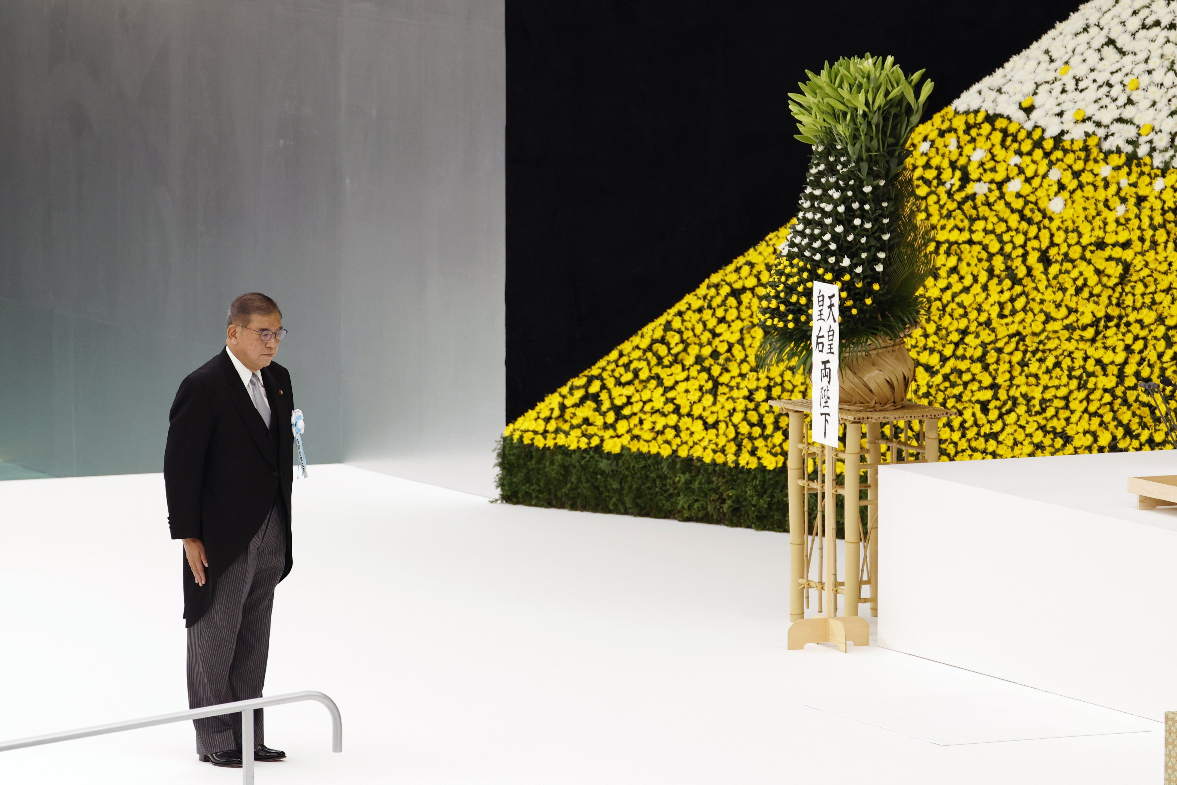 Japanese Prime Minister Shigeru Ishiba stands after giving a speech during the National Memorial Ceremony for the War Dead in Tokyo, Japan, on August 15, marking the 80th anniversary of the end of World War II. Photo: EPA