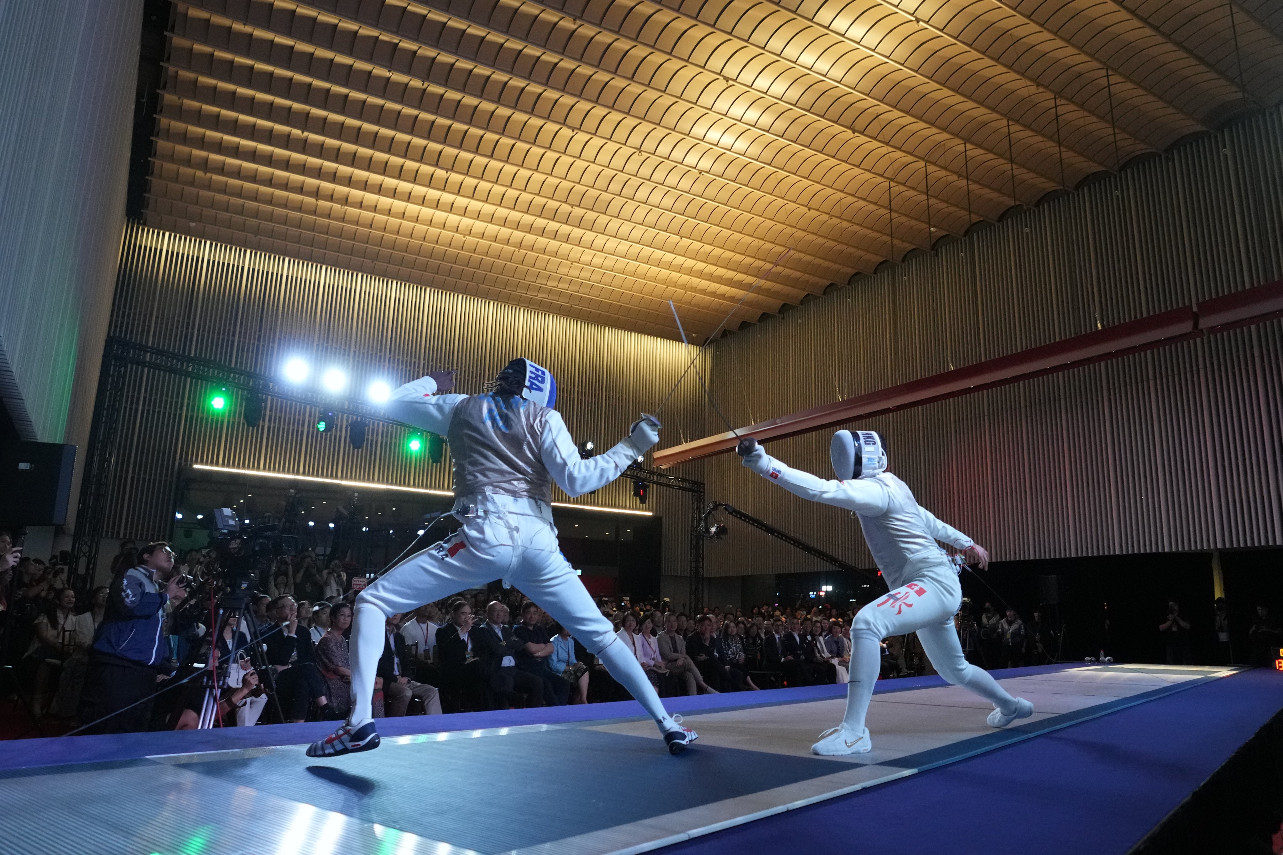 Cheung Ka-long (right) takes on Enzo Lefort at Hong Kong Palace Museum on Tuesday. Photo: Sam Tsang