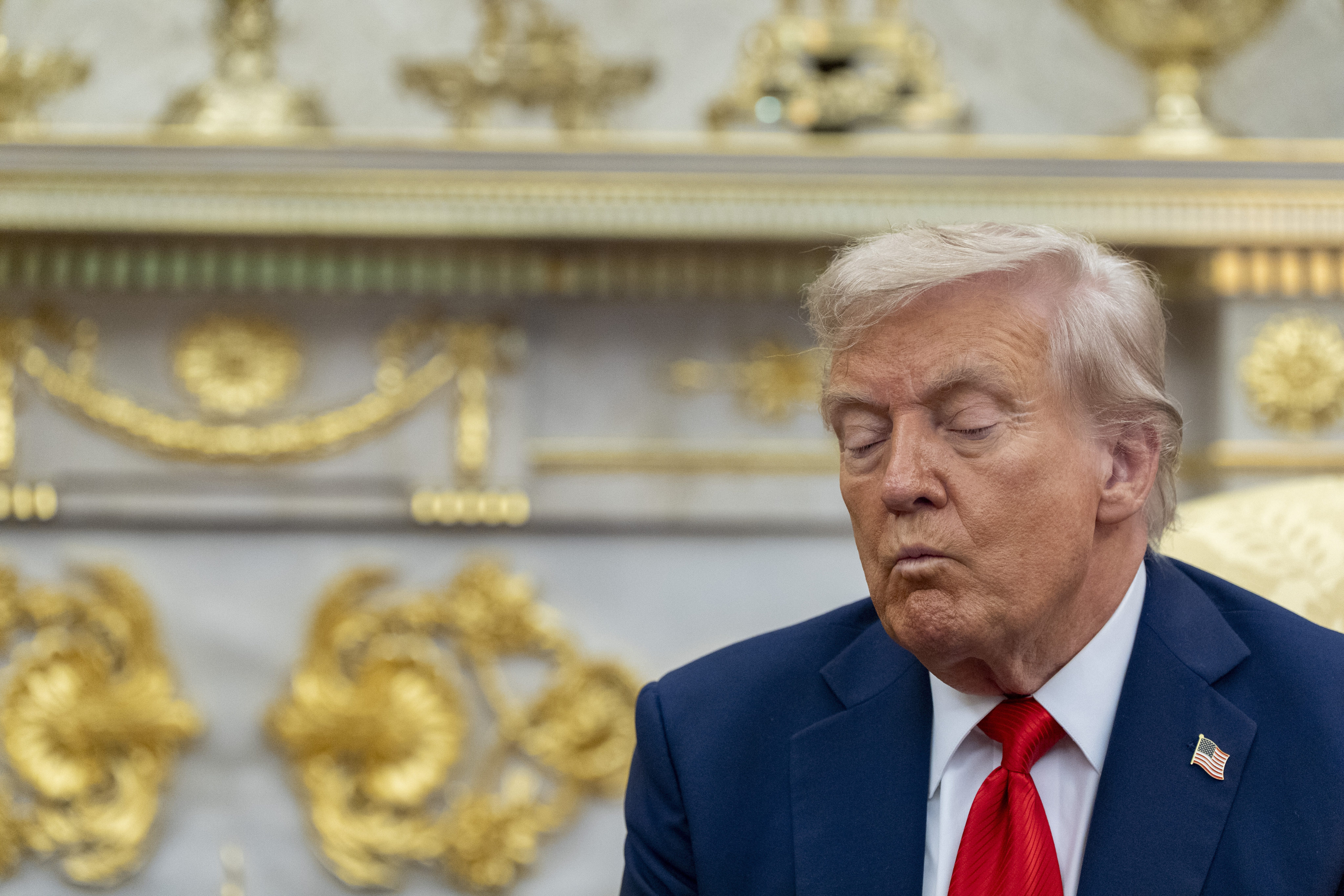 US President Donald Trump listens as he meets with South Korean President Lee Jae Myung in the Oval Office of the White House on Monday. Photo: AP
