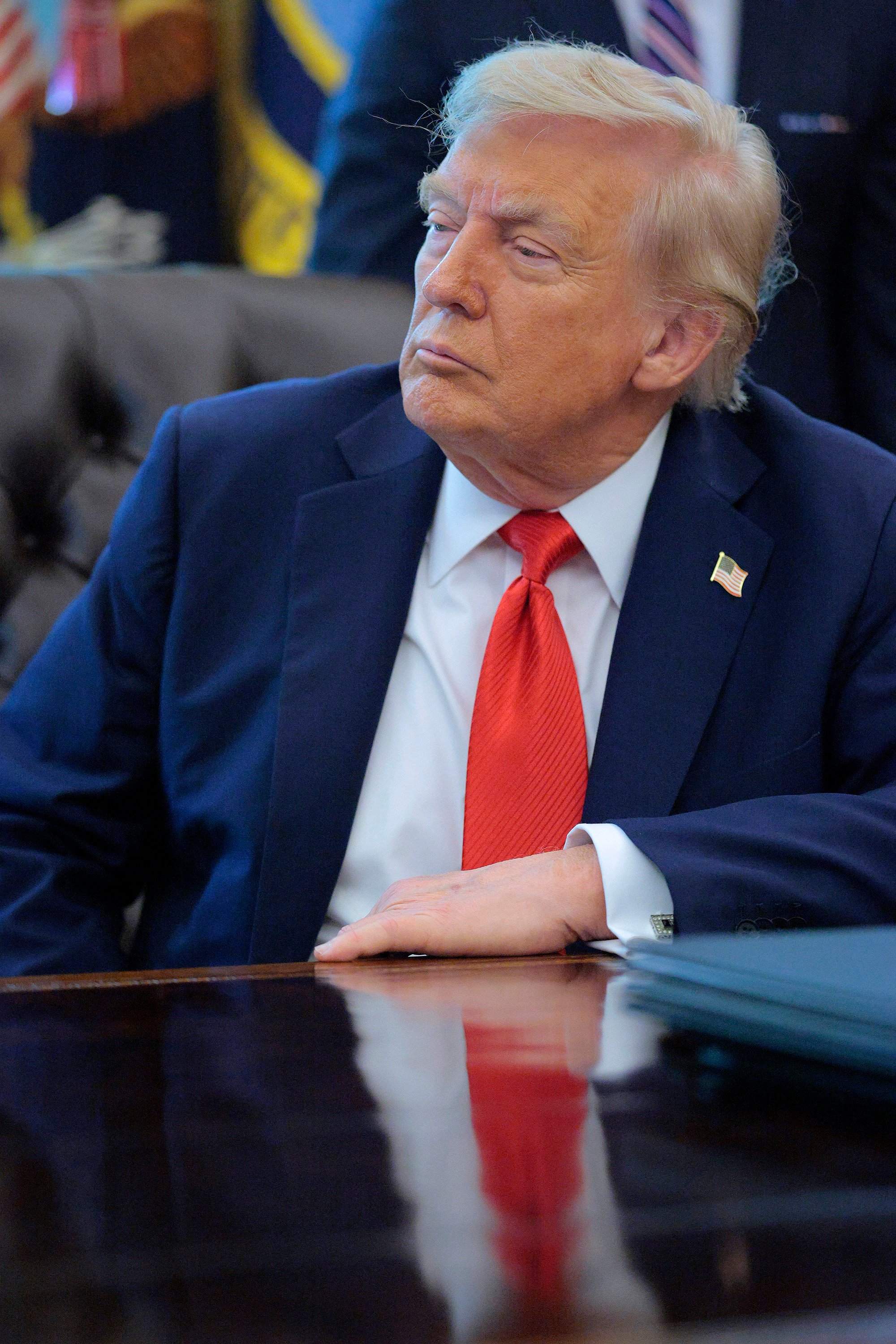 US President Donald Trump talks to journalists at the White House on Monday. Photo: TNS