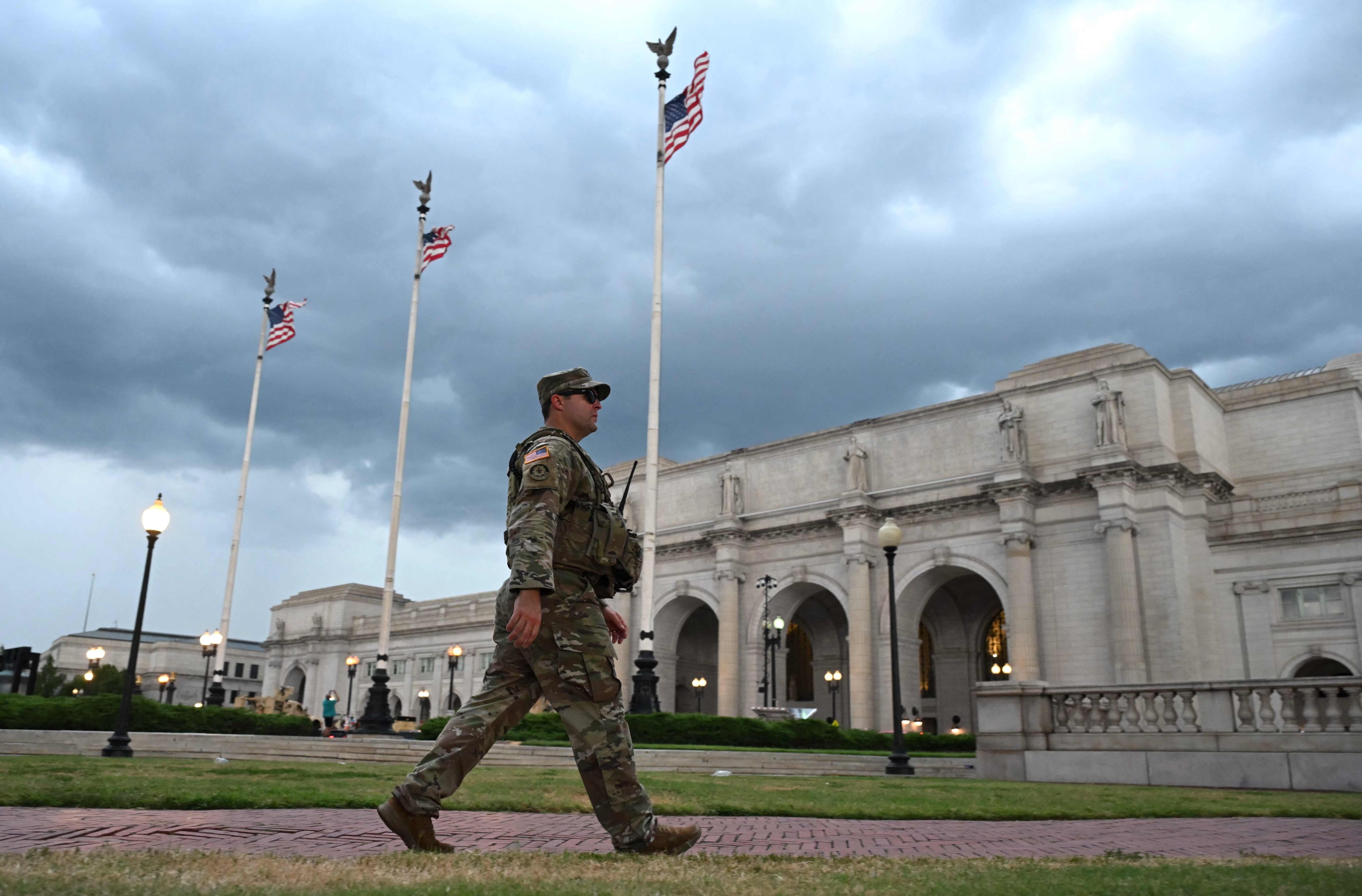 Members of the National Guard patrol outside Union Station as a storm approaches in Washington earlier this month. Photo: AFP