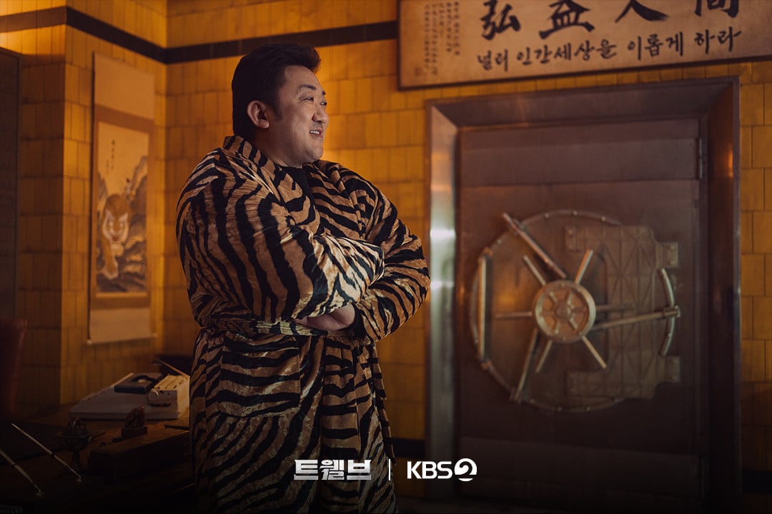 Ma Dong-seok as angel Tae-san in a still from the new Disney+ Korean drama series Twelve. Park Hyung-sik and Seo In-guk co-star.